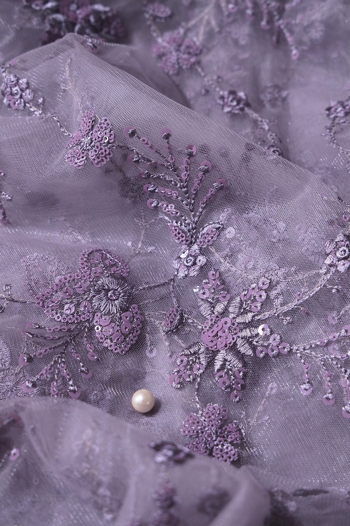 Beautiful Grey Thread With Sequins Floral Embroidery Work On Purple Grey Soft Net Fabric