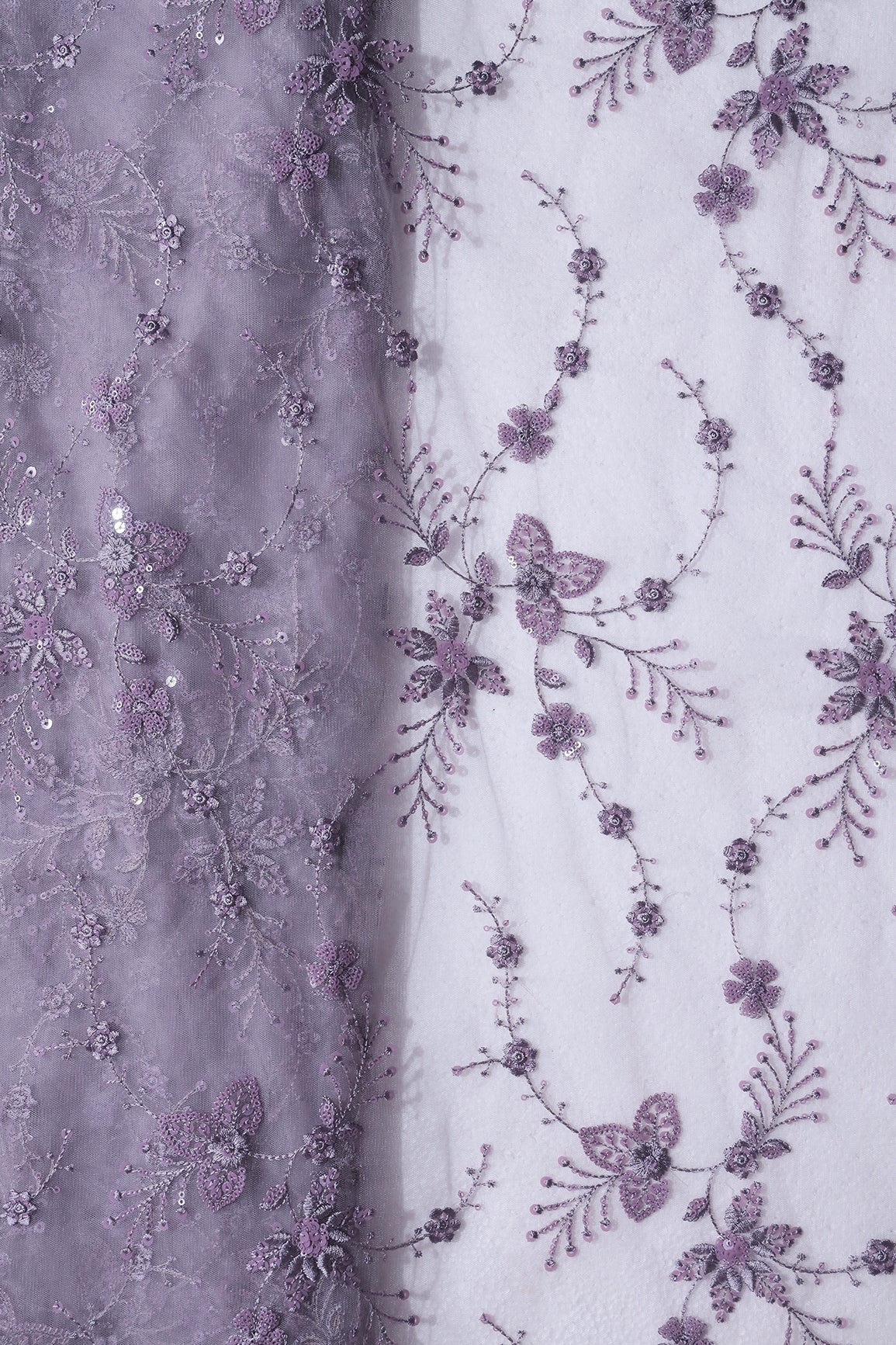 Beautiful Grey Thread With Sequins Floral Embroidery Work On Purple Grey Soft Net Fabric