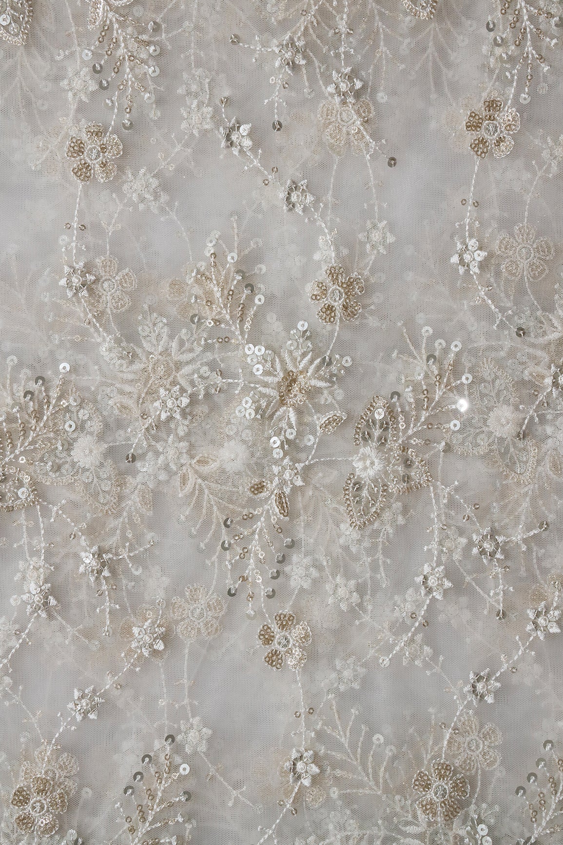 Beautiful White Thread With Sequins Floral Embroidery Work On White Dyeable Soft Net Fabric