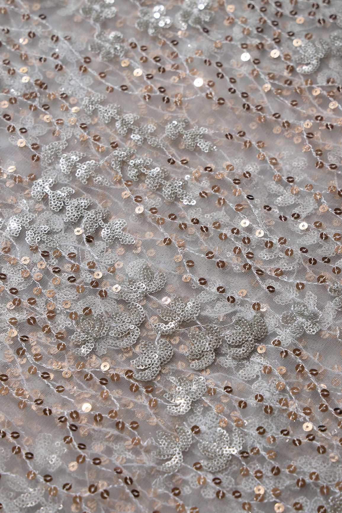 Gold And Silver Sequins Heavy Embroidery On Dyeable White Soft Net Fabric