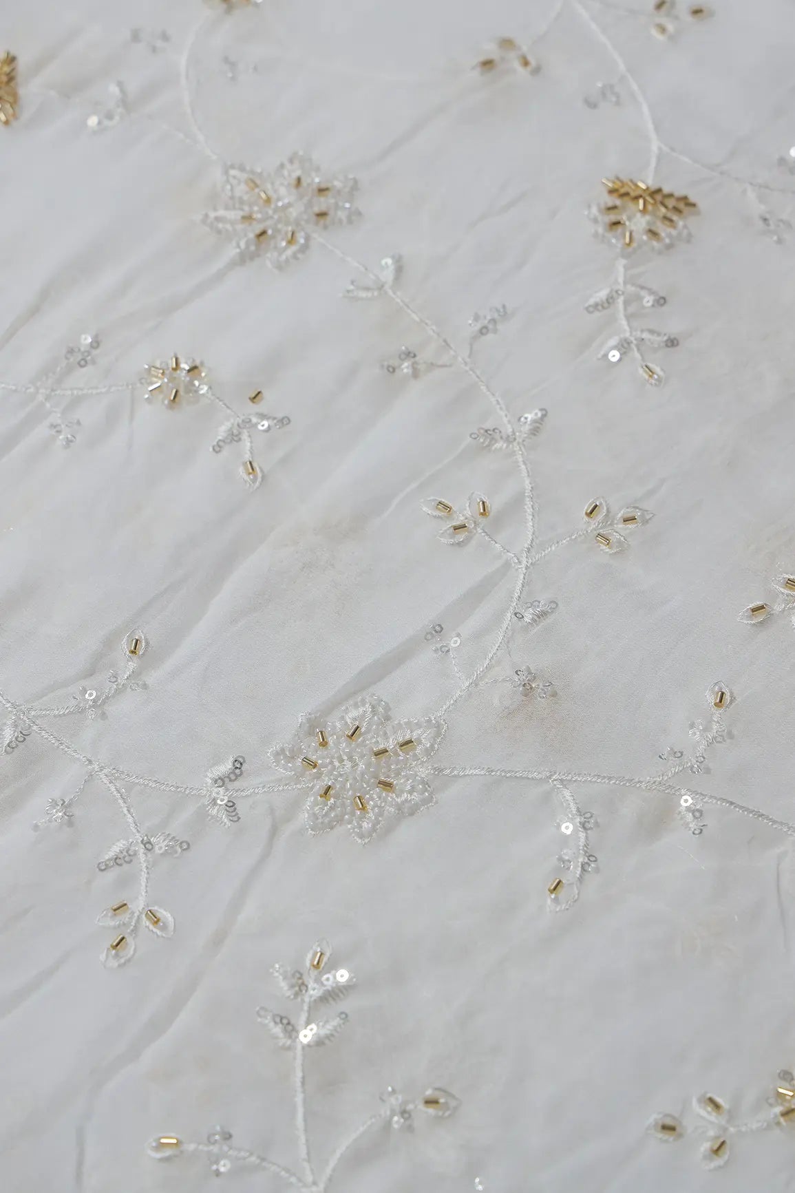 Beautiful Sequins With Beads Floral Embroidery On White Viscose Georgette Fabric