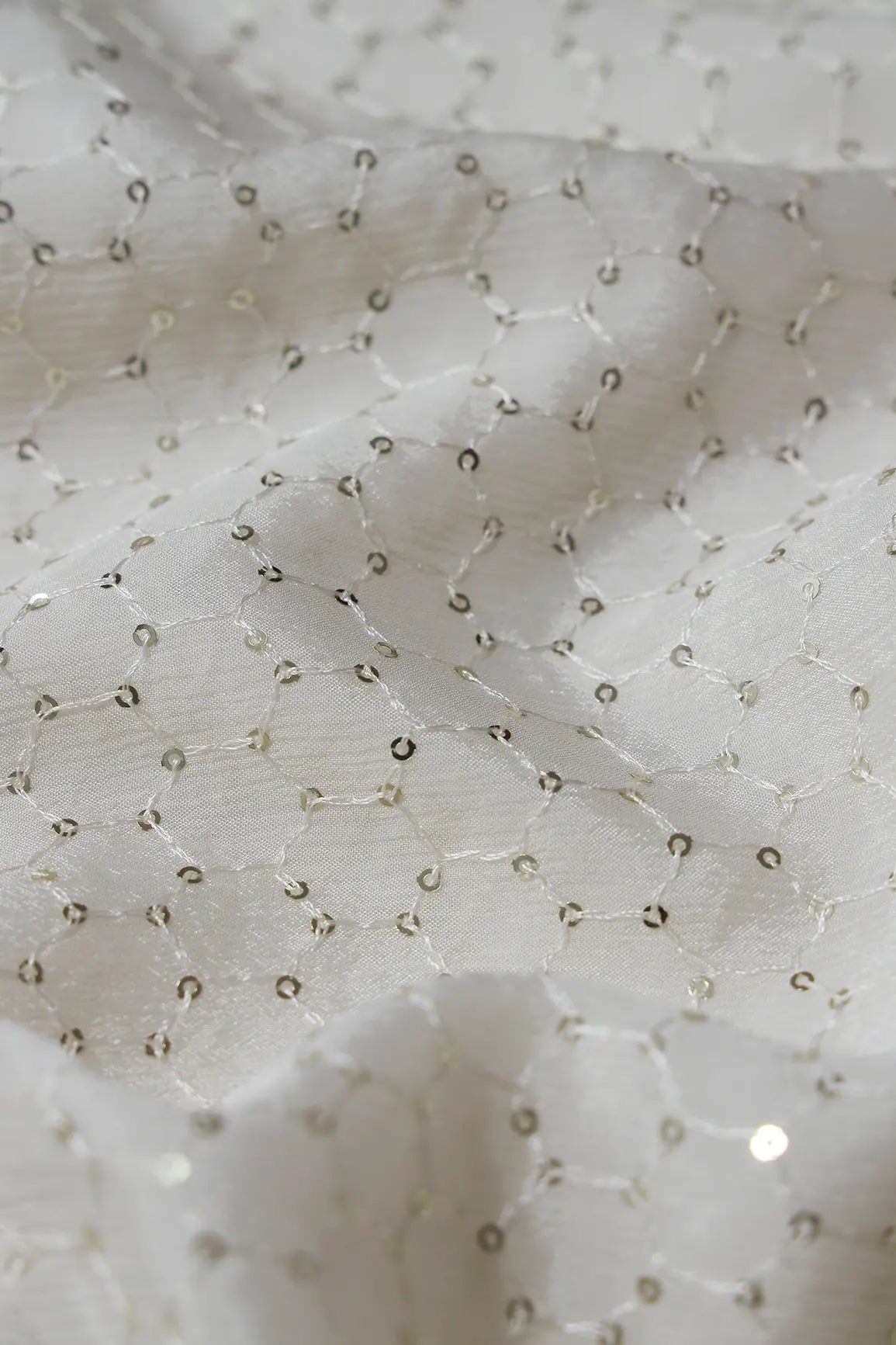 Small Trellis Gold Sequins Embroidery Work On White Dyeable Chinnon Chiffon Fabric