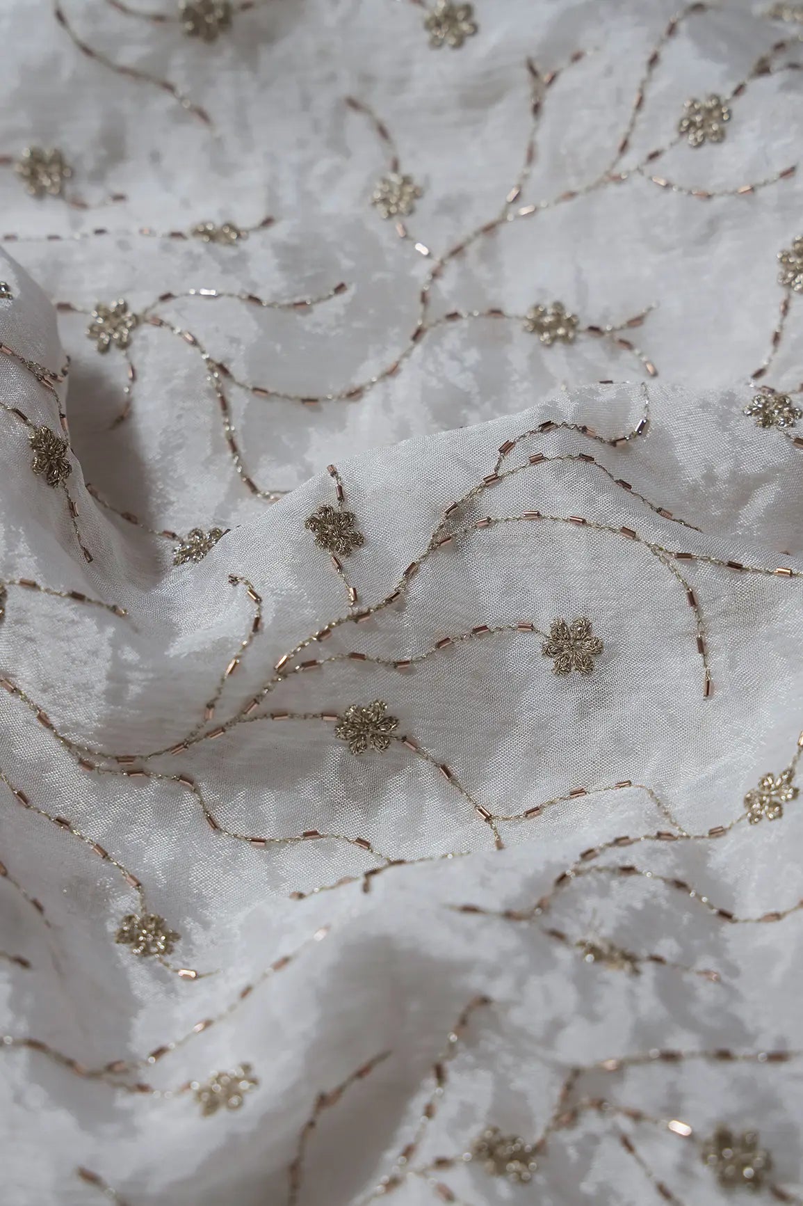 Gold Zari With Beads Floral Leafy Embroidery Work On White Dyeable Chinnon Chiffon Fabric