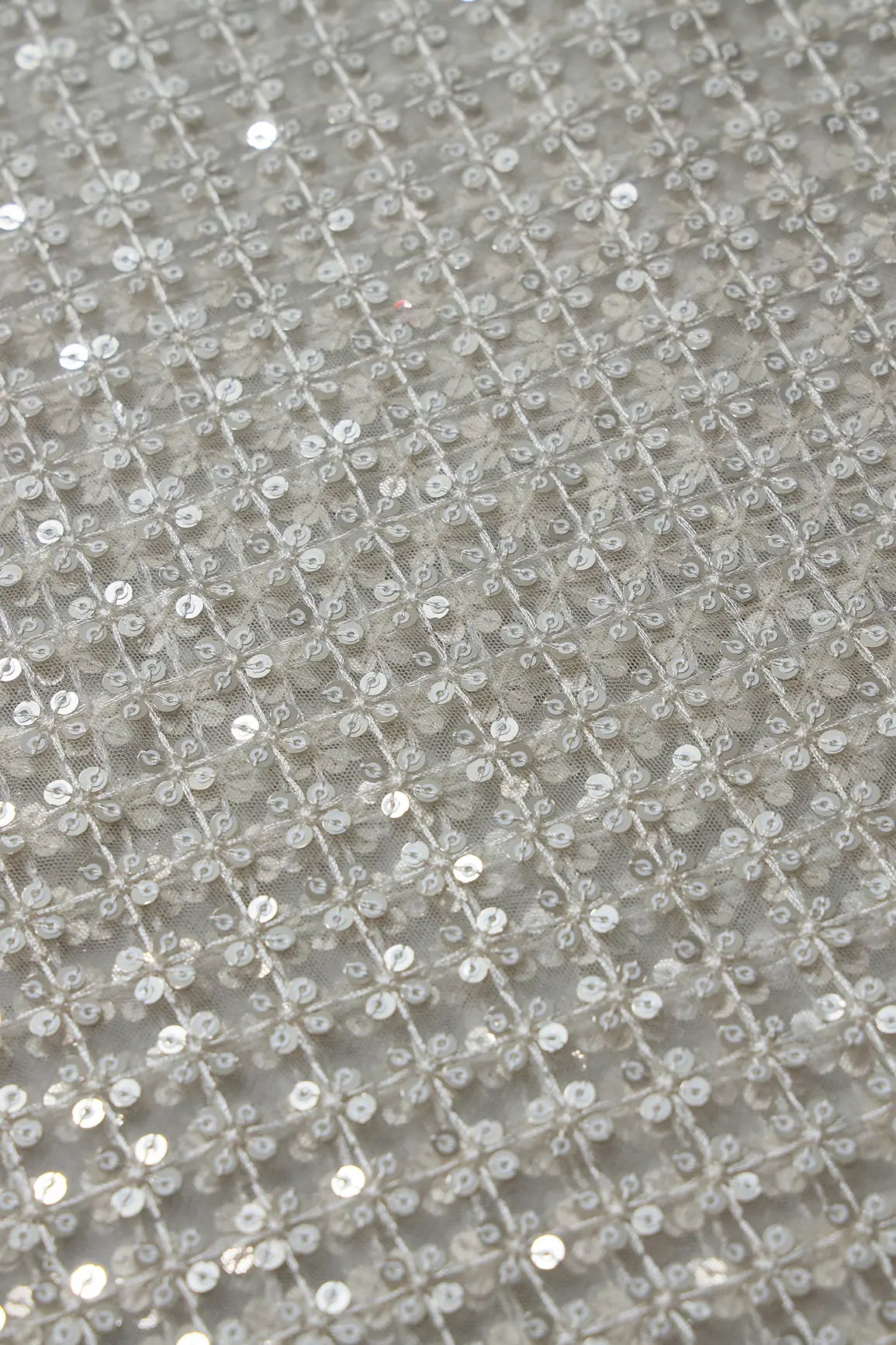 White Thread With Gold Sequins Small Checks Embroidery On White Dyeable Soft Net Fabric