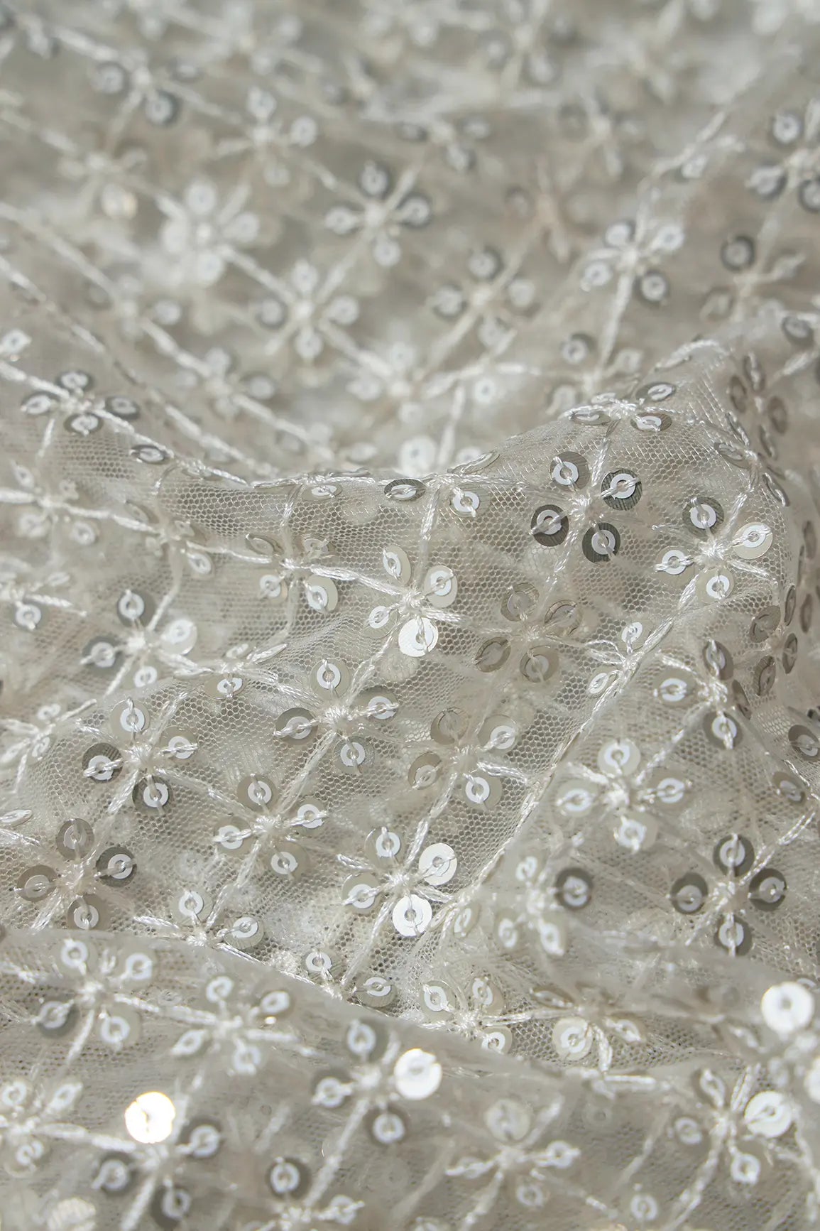 White Thread With Gold Sequins Small Checks Embroidery On White Dyeable Soft Net Fabric