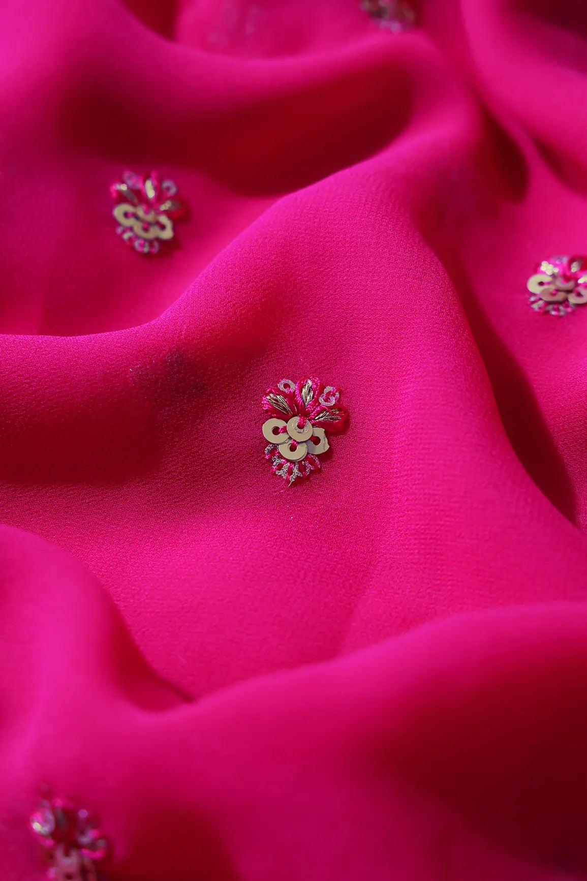 Gold Sequins With Zari Small Floral Booti Embroidery On Fuchsia Georgette Fabric