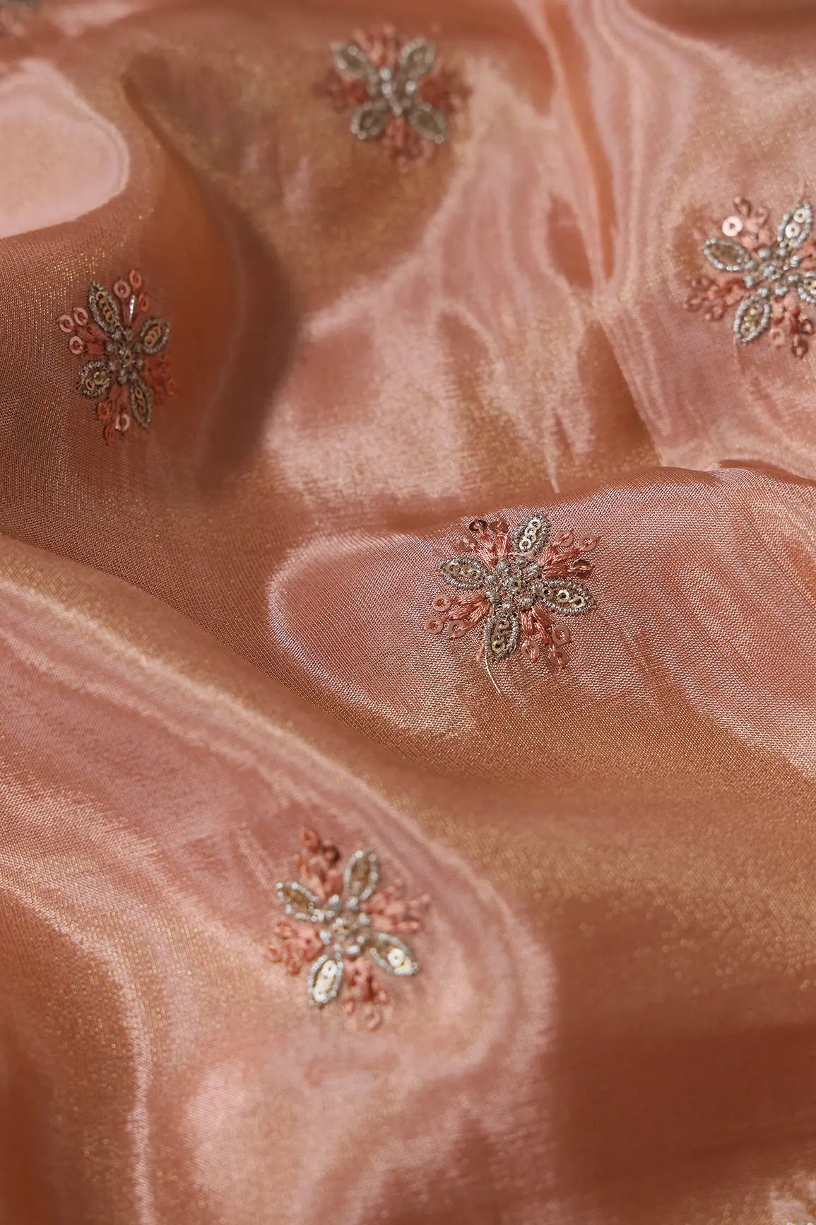 Gold Sequins And Zari Floral Booti Embroidery Work On Peach Pure Viscose Zari Tissue Fabric