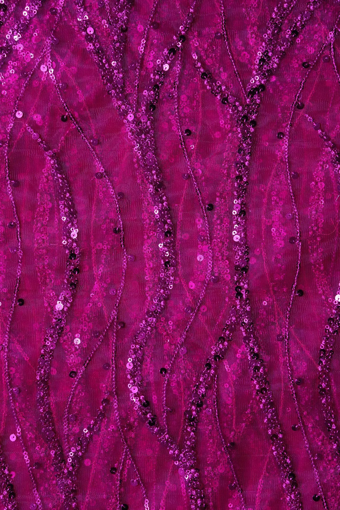 Beautiful Sequins With Fuchsia Thread Wavy Embroidery Work On Fuchsia Soft Net Fabric