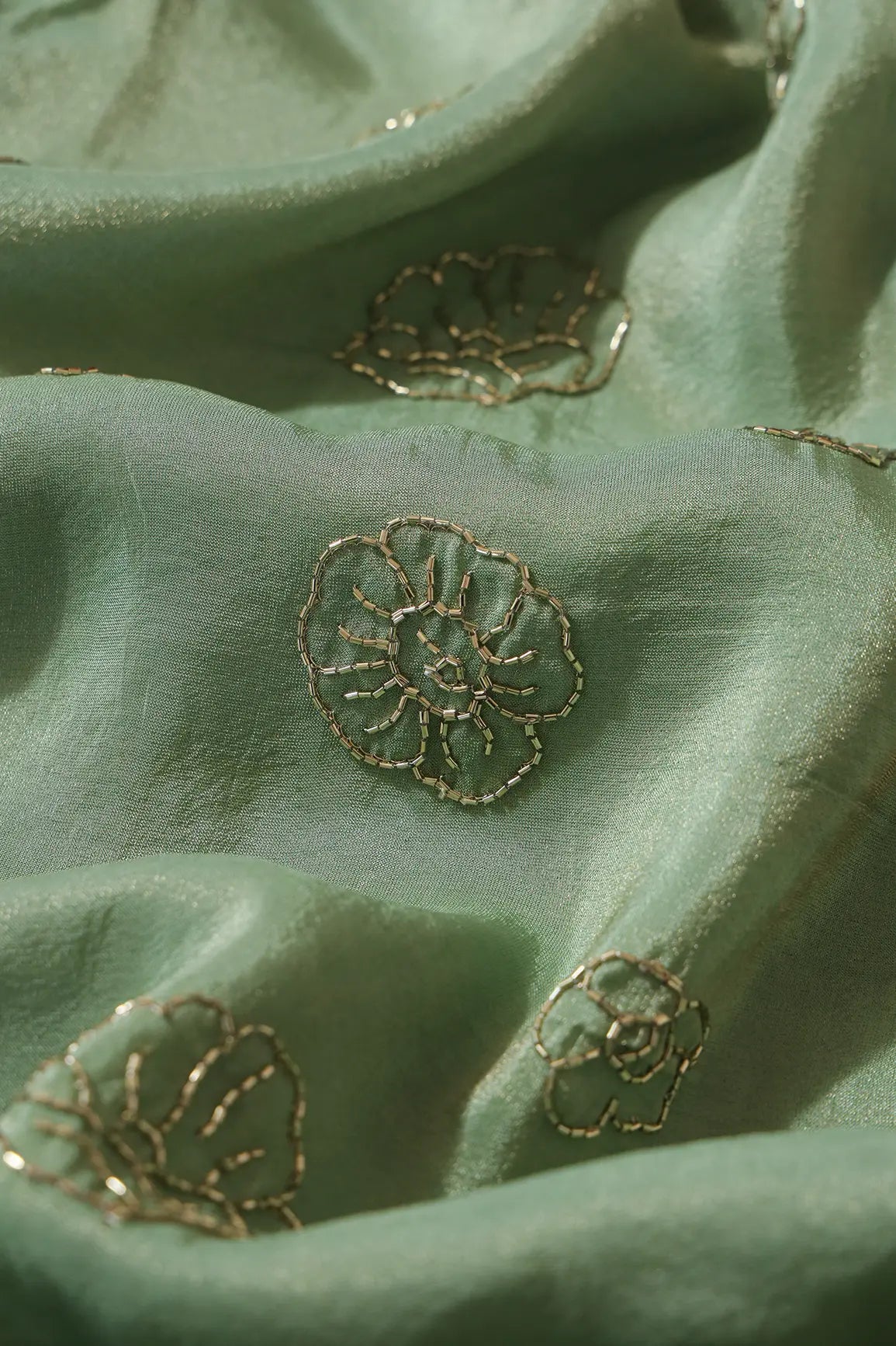 Cut Dana Beads Floral Embroidery Work On Olive Pure Viscose Zari Tissue Fabric