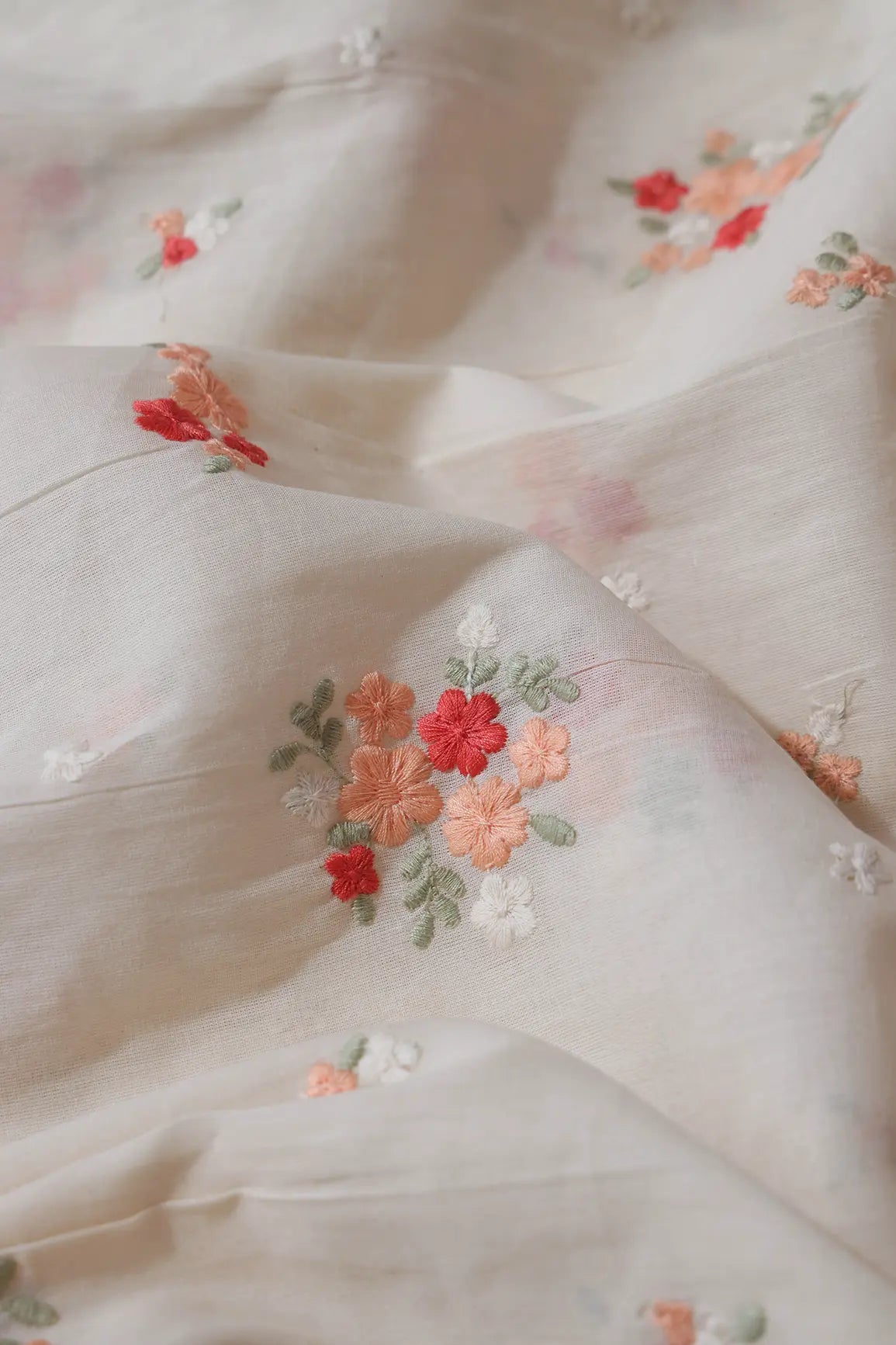 Red And Peach Thread Beautiful Floral Embroidery On Off White Organic Cotton Fabric