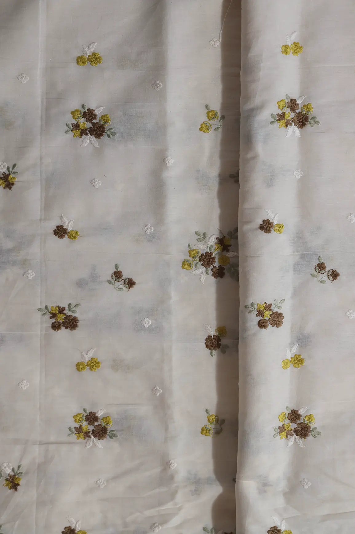 Brown And Yellow Thread Beautiful Floral Embroidery On Off White Organic Cotton Fabric