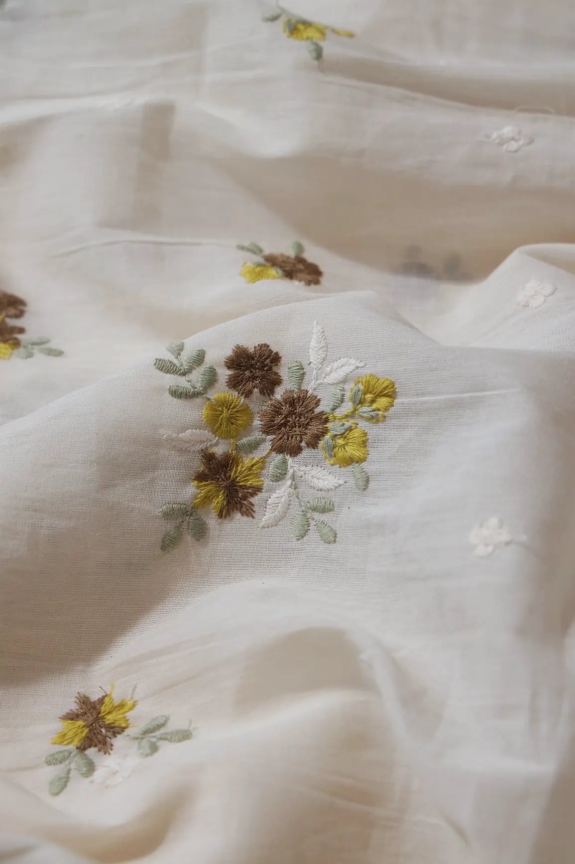 Brown And Yellow Thread Beautiful Floral Embroidery On Off White Organic Cotton Fabric