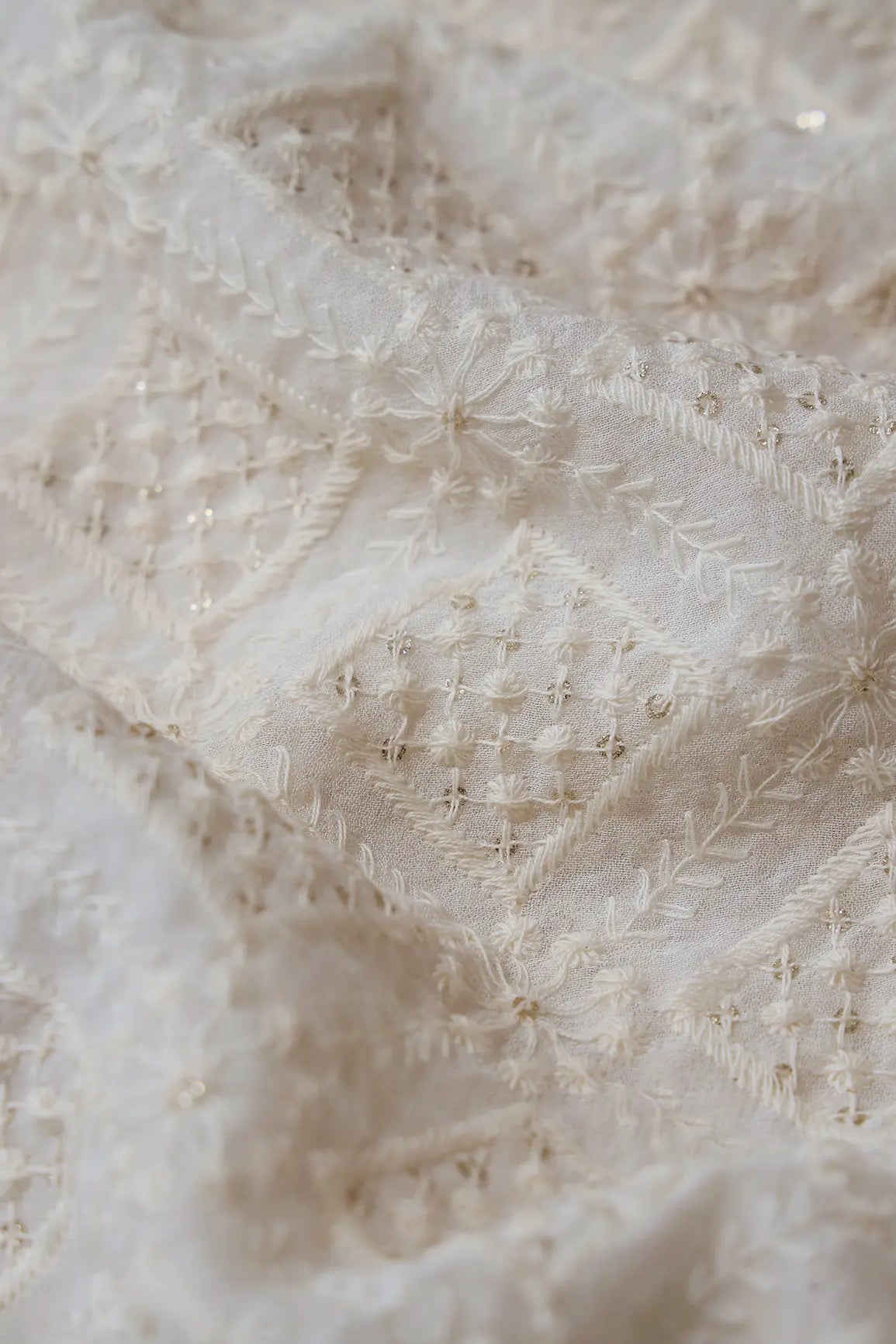 White Thread With Gold Glitter Sequins Checks Lucknowi Embroidery On Dyeable Viscose Georgette Fabric