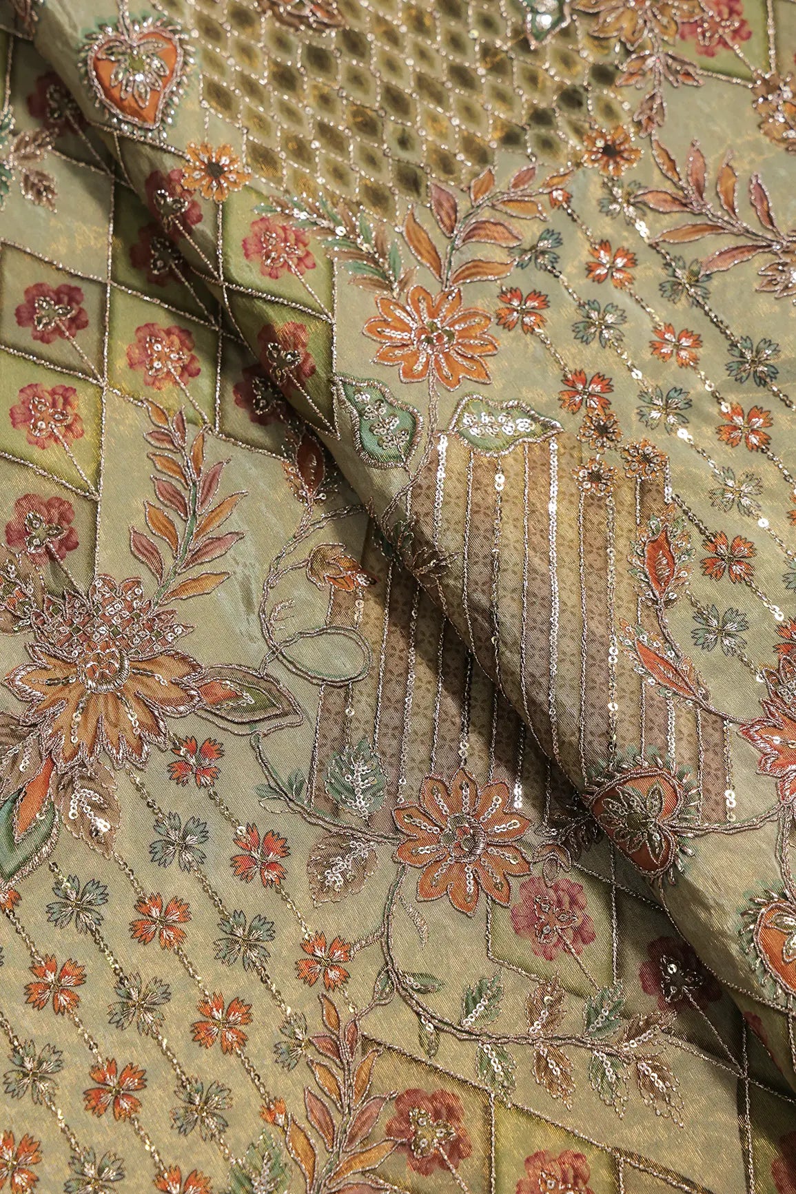 Floral Positional Print On Sequins With Zari Embroidery Work On Olive Green Viscose Zari Tissue Fabric