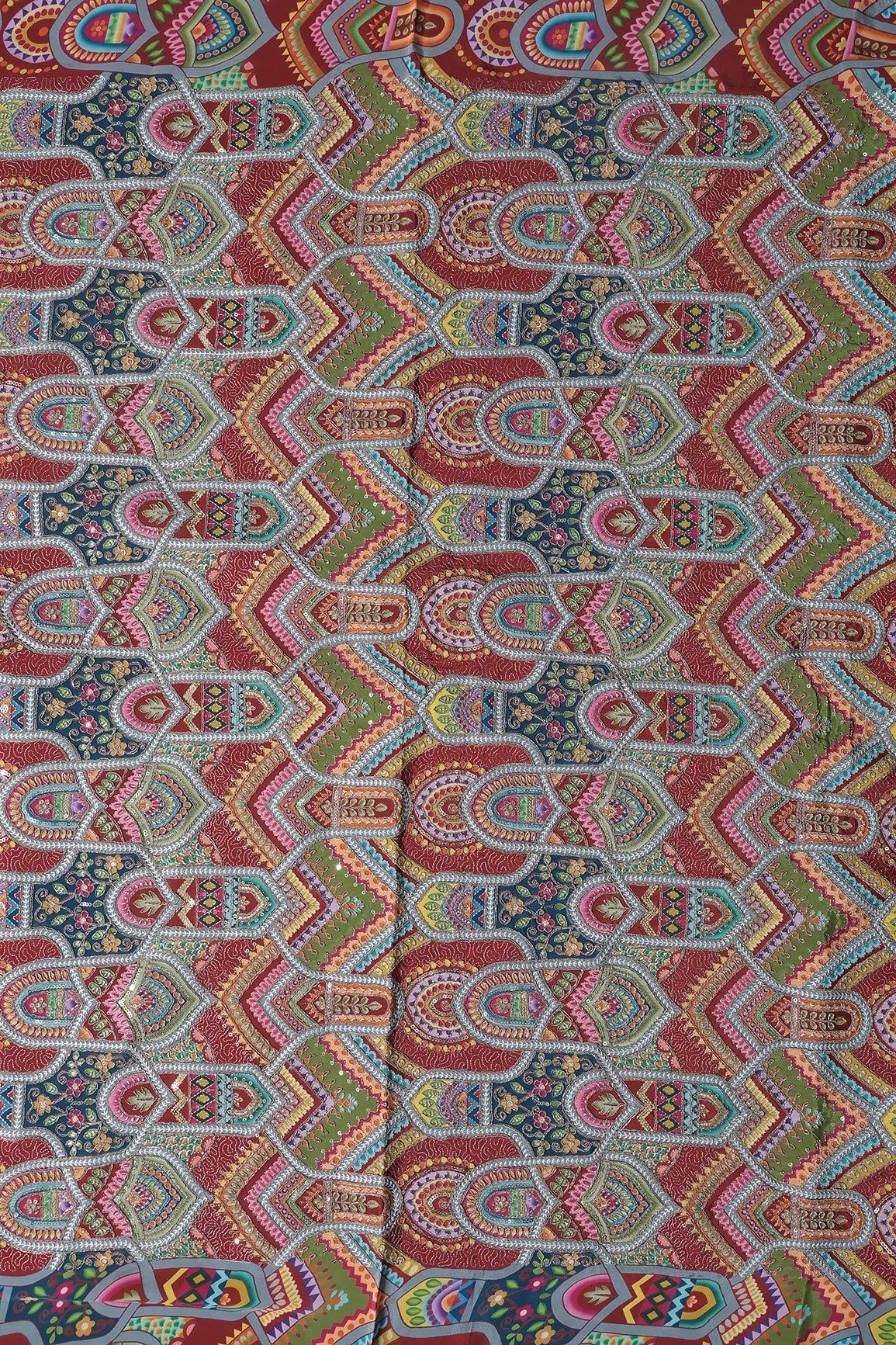 Zari & Sequins With Multi Color Geometric Print Heavy Embroidery Work On Maroon Pure Crepe Fabric