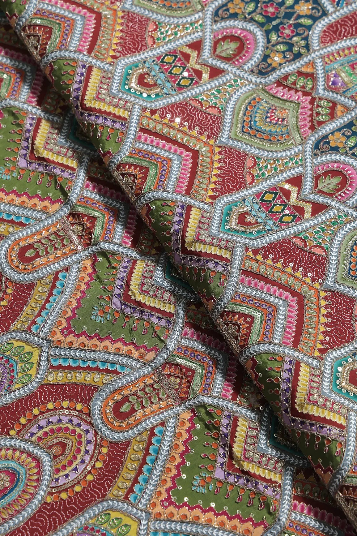 Zari & Sequins With Multi Color Geometric Print Heavy Embroidery Work On Maroon Pure Crepe Fabric