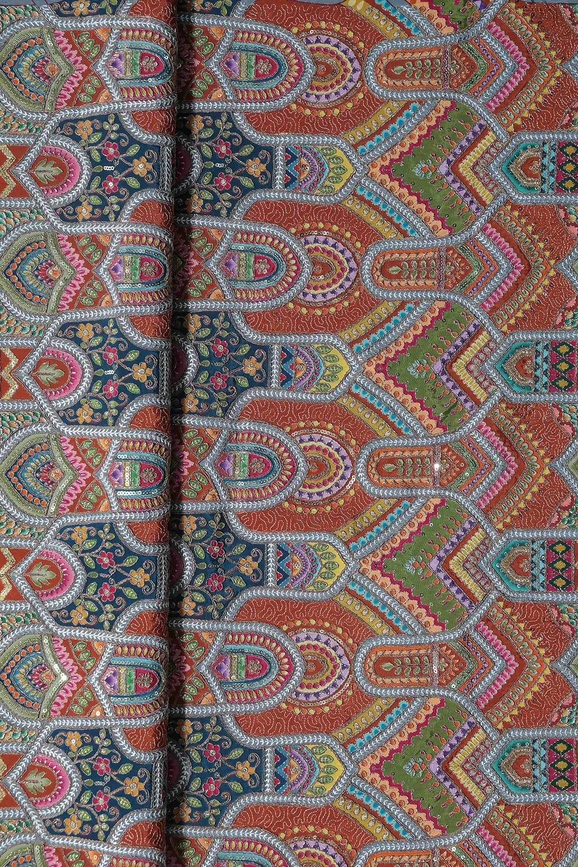 Zari & Sequins With Multi Color Geometric Print Heavy Embroidery Work On Rust Pure Crepe Fabric