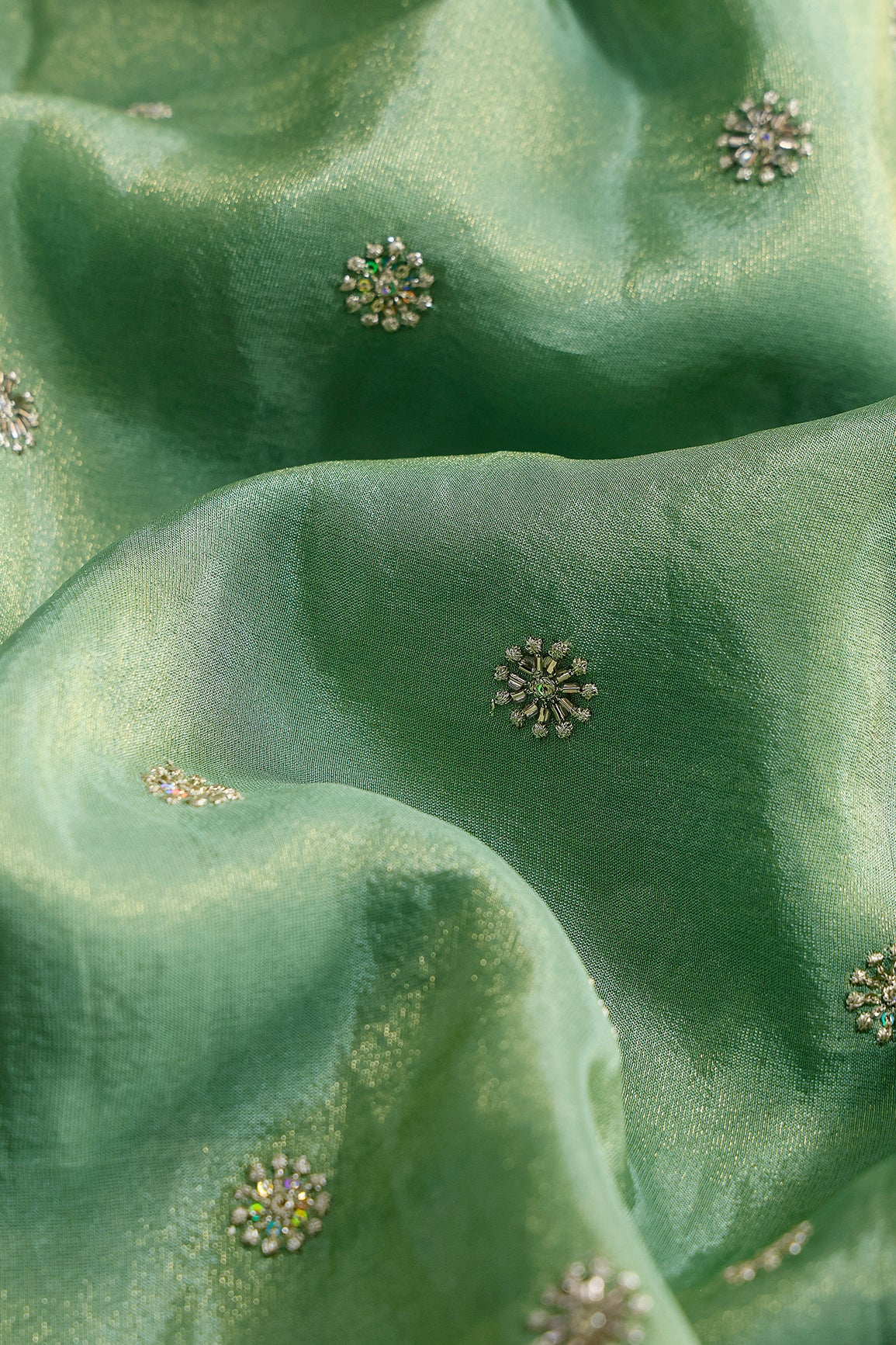 Multi Sequins & Beads With Zari Floral Butti Embroidery Work On Olive Viscose Zari Tissue Fabric