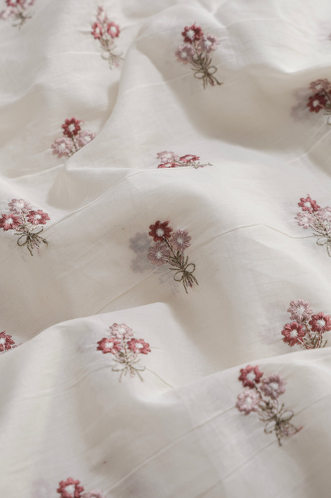 Mauve And Onion Pink Thread Small Floral Embroidery Work On Off White Organic Cotton Fabric