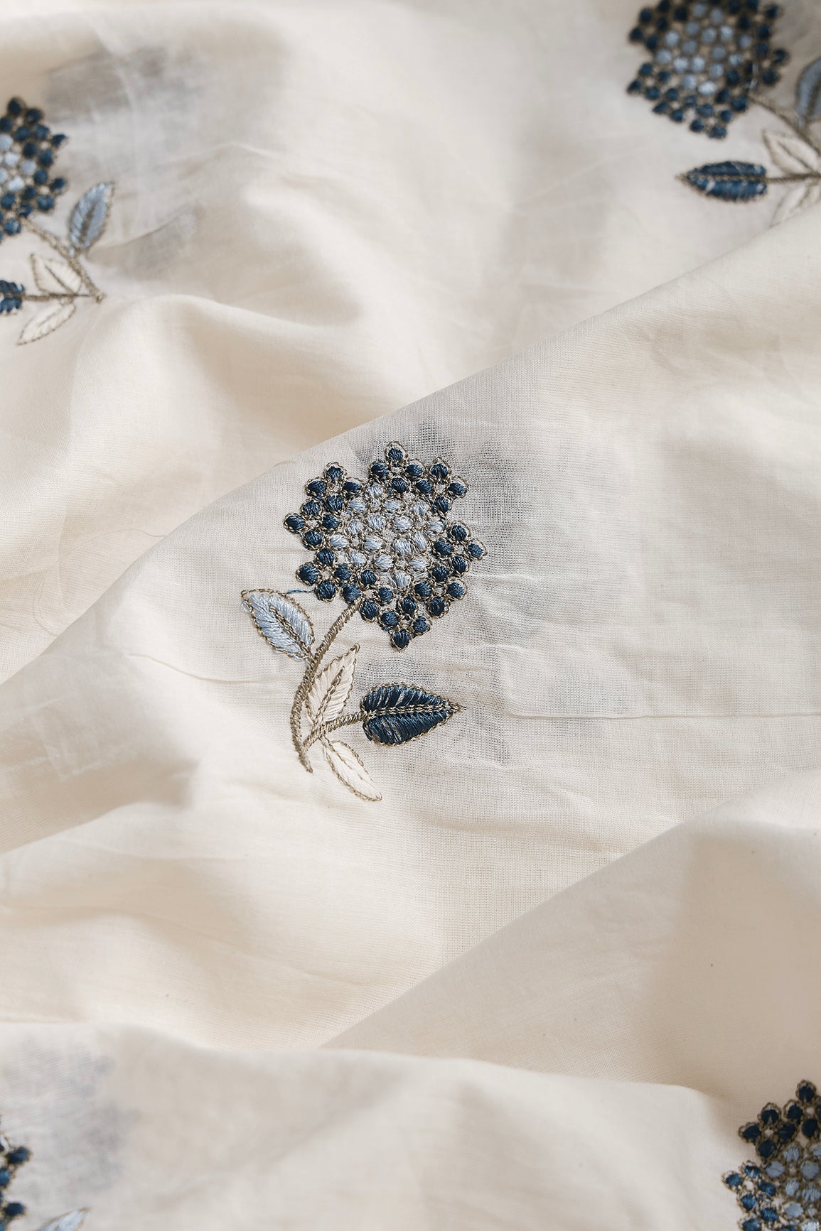 Multi Thread Beautiful Floral Embroidery Work On Off White Organic Cotton Fabric