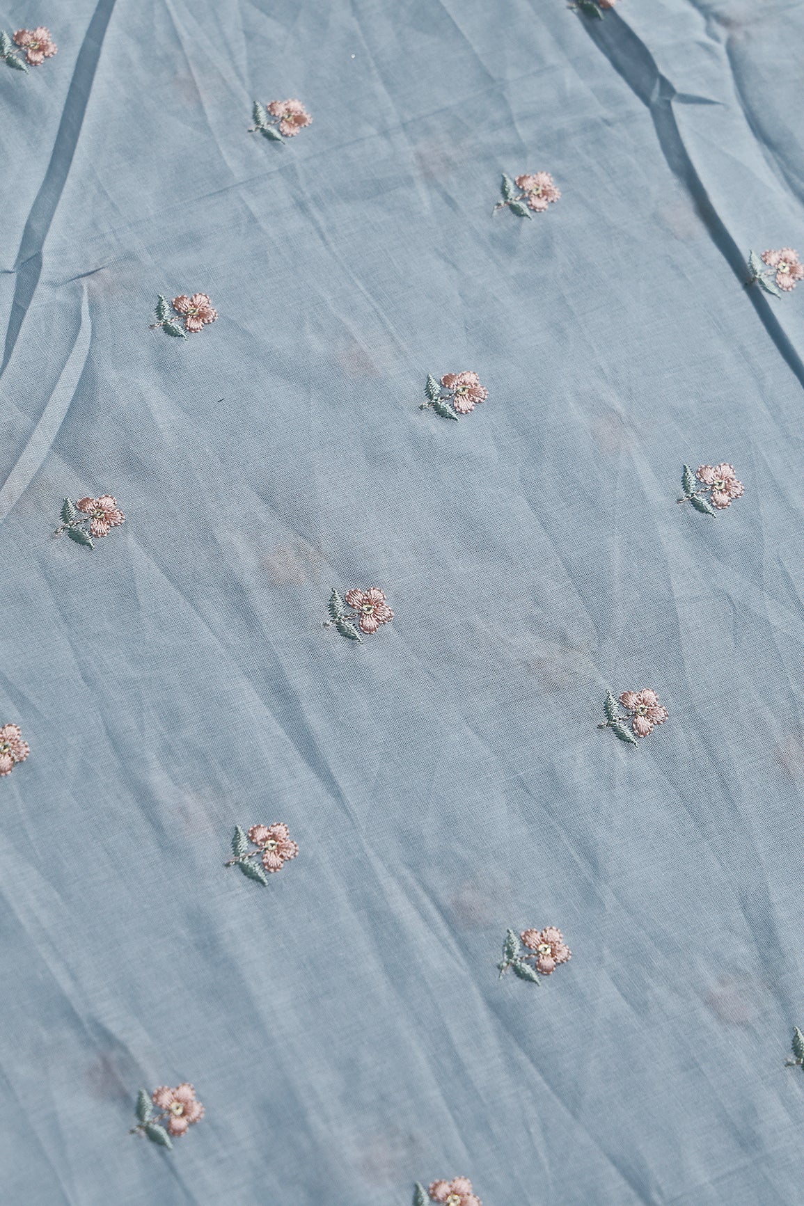 Peach & Olive Thread Small Floral Embroidery Work On Pastel Blue Pure Mul Cotton Fabric