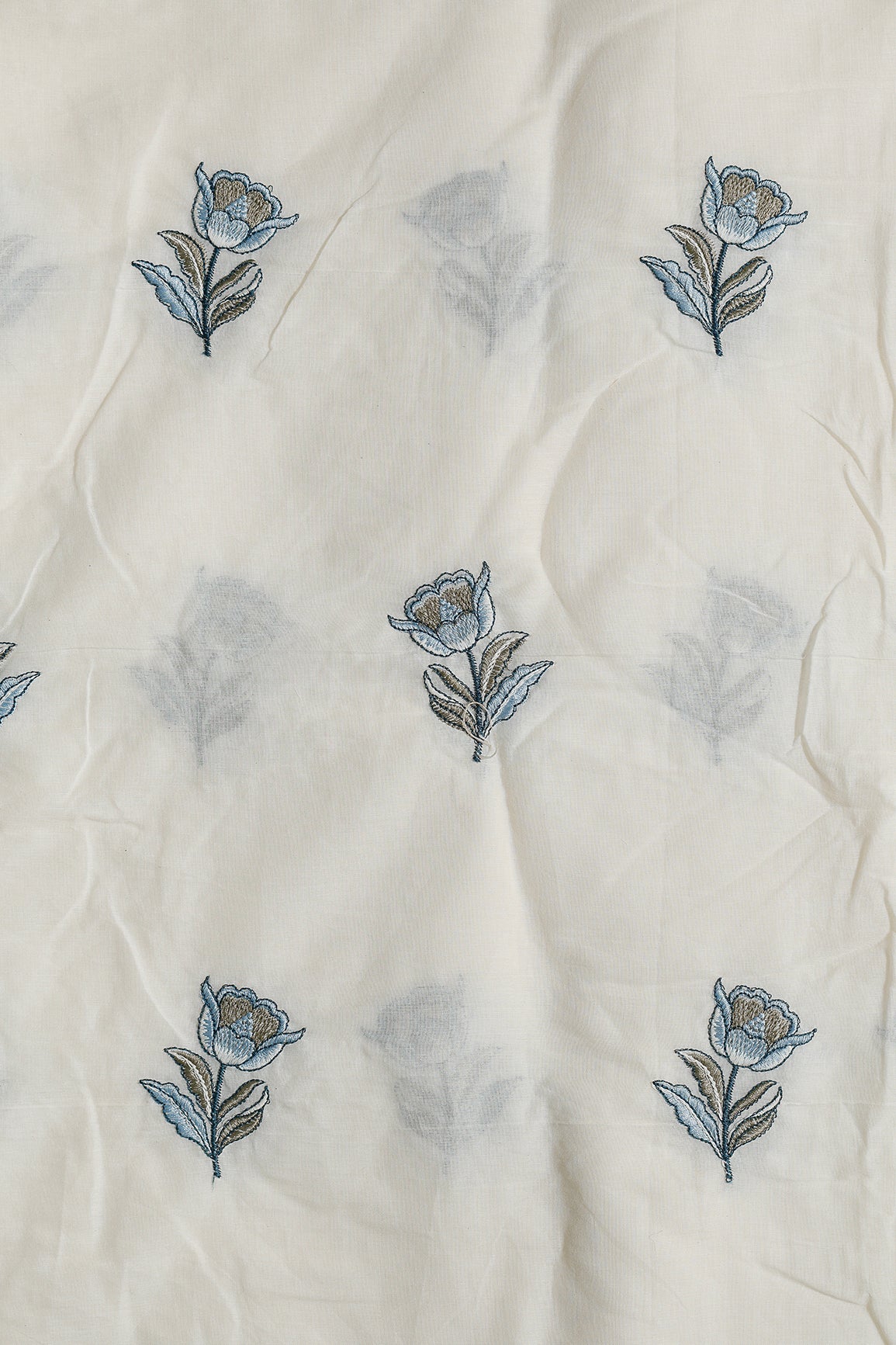 Blue And Olive Thread Beautiful Floral Embroidery Work On Off White Organic Cotton Fabric