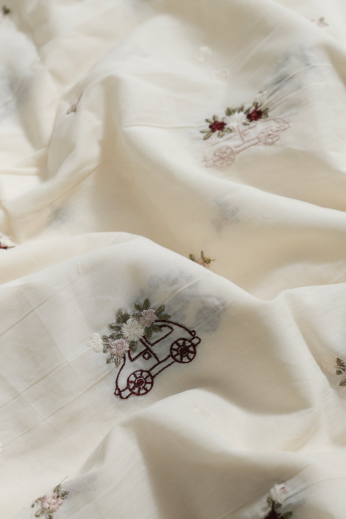 Multi Color Thread Car Motif Embroidery Design Work On Off White Organic Cotton Fabric