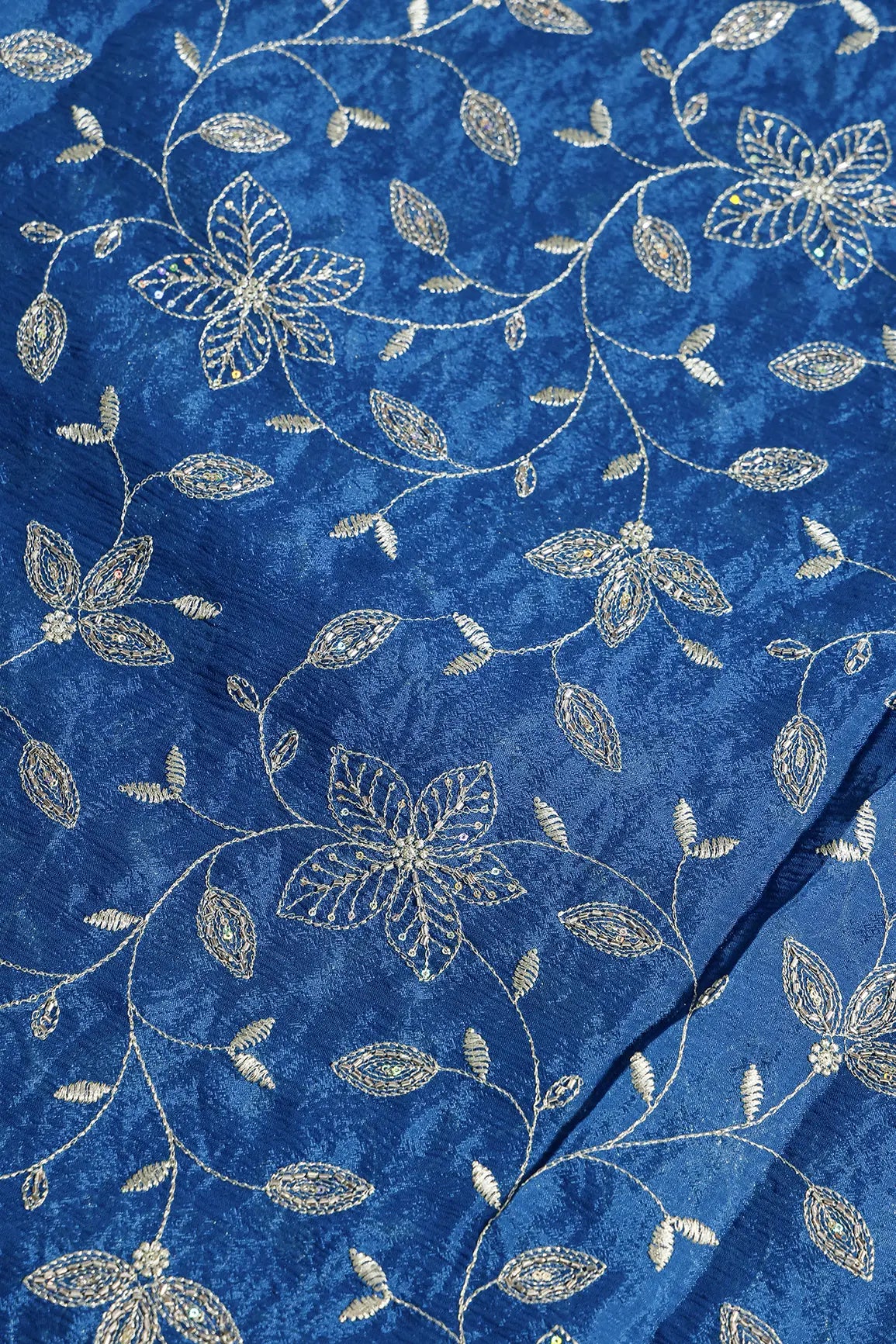 Multi Sequins & Beads With Zari Floral Leafy Embroidery Work On Prussian Blue Chinnon Chiffon Fabric