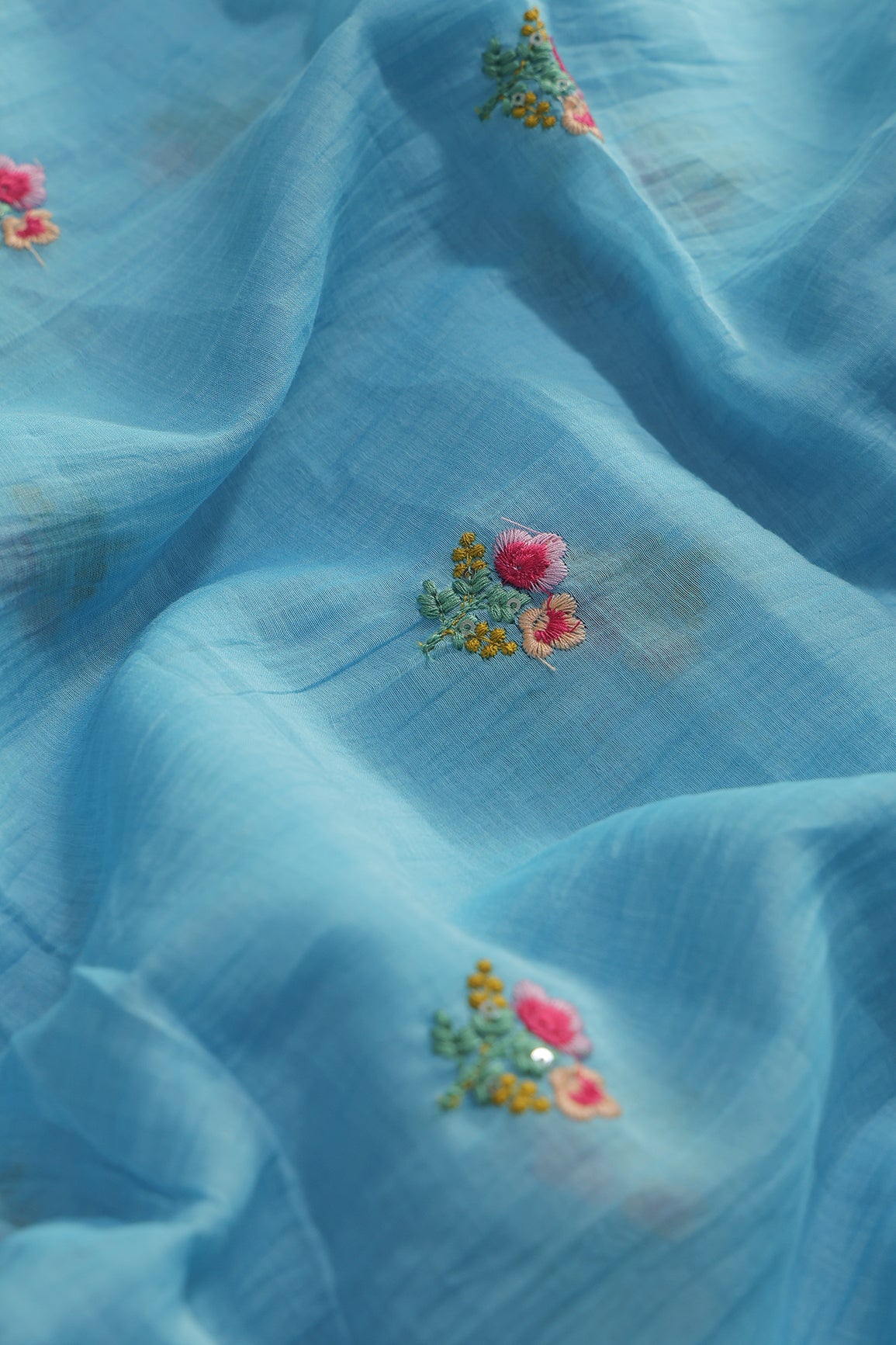 Multi Thread Flower Embroidery On Sky Blue Pure Mul Chanderi Silk Fabric