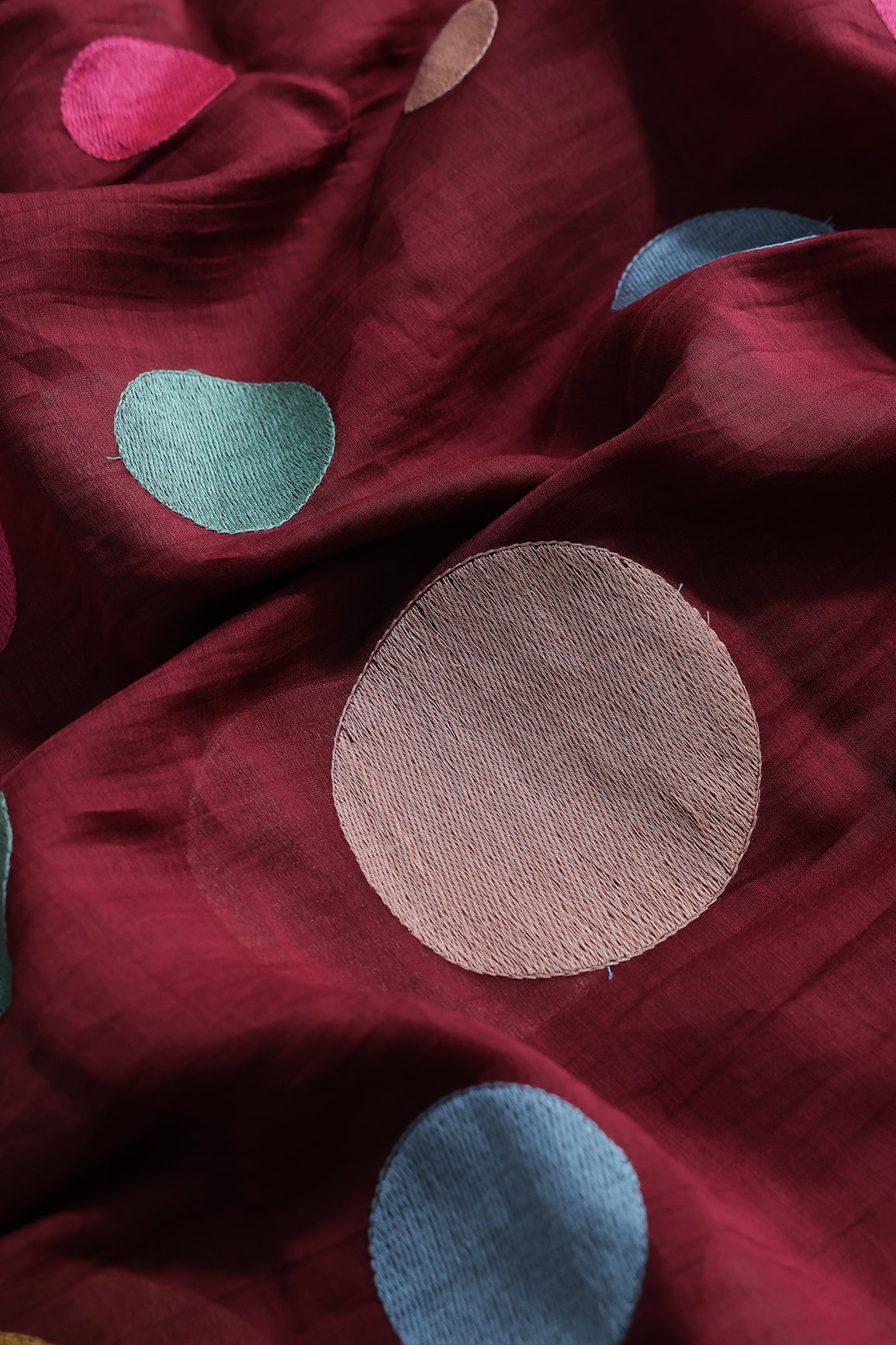 Multi Thread Circle Embroidery On Maroon Pure Mul Chanderi Silk Fabric