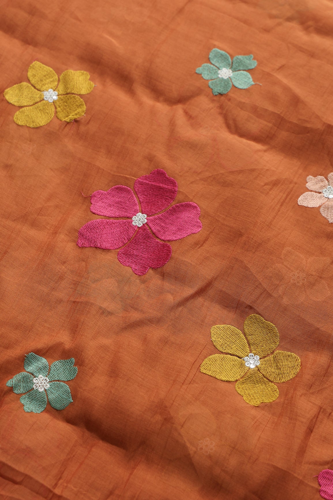 Multi Thread Flower Embroidery On Rust Pure Mul Chanderi Silk Fabric