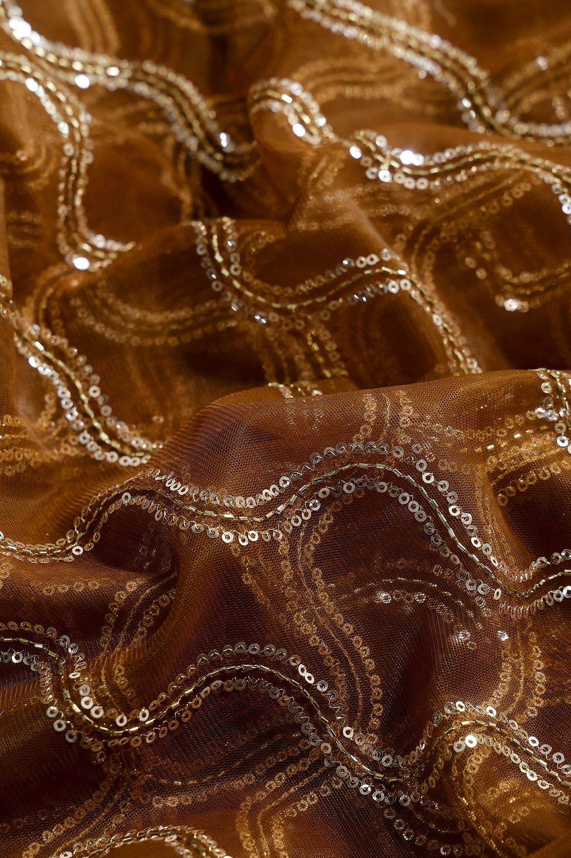 Leheriya Embroidery Work With Sequins And Beads On Brown Soft Net Fabric
