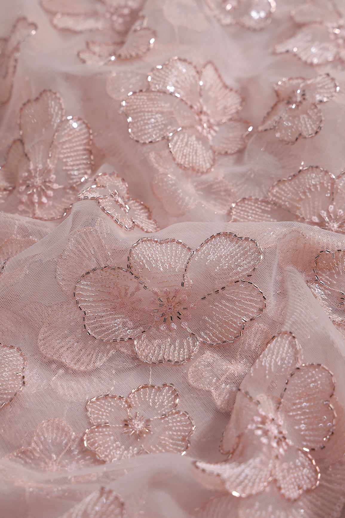 Floral Water Sequins Tone To Tone Embroidery On Peach Soft Net Fabric