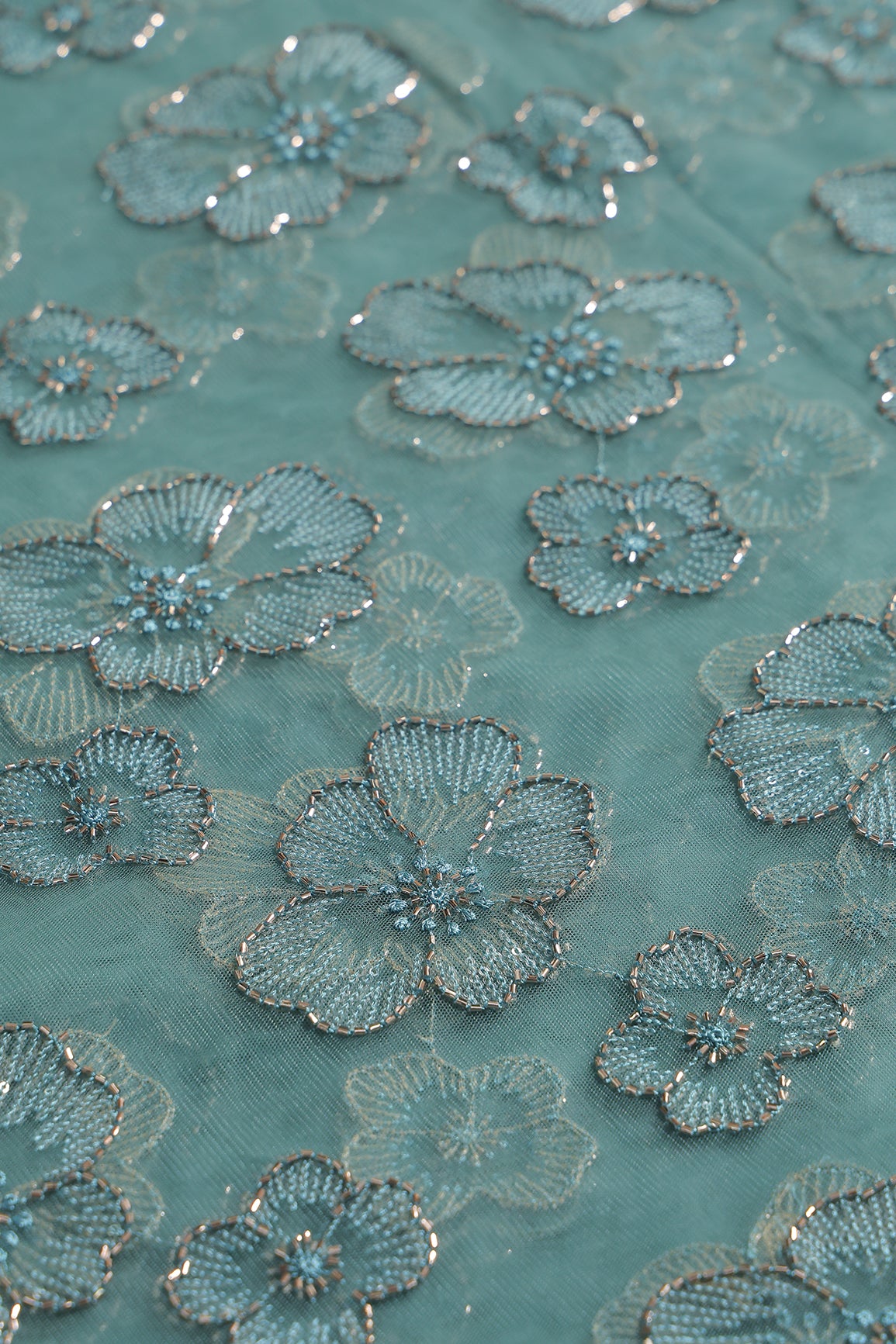 Floral Water Sequins Tone To Tone Embroidery On Teal Soft Net Fabric