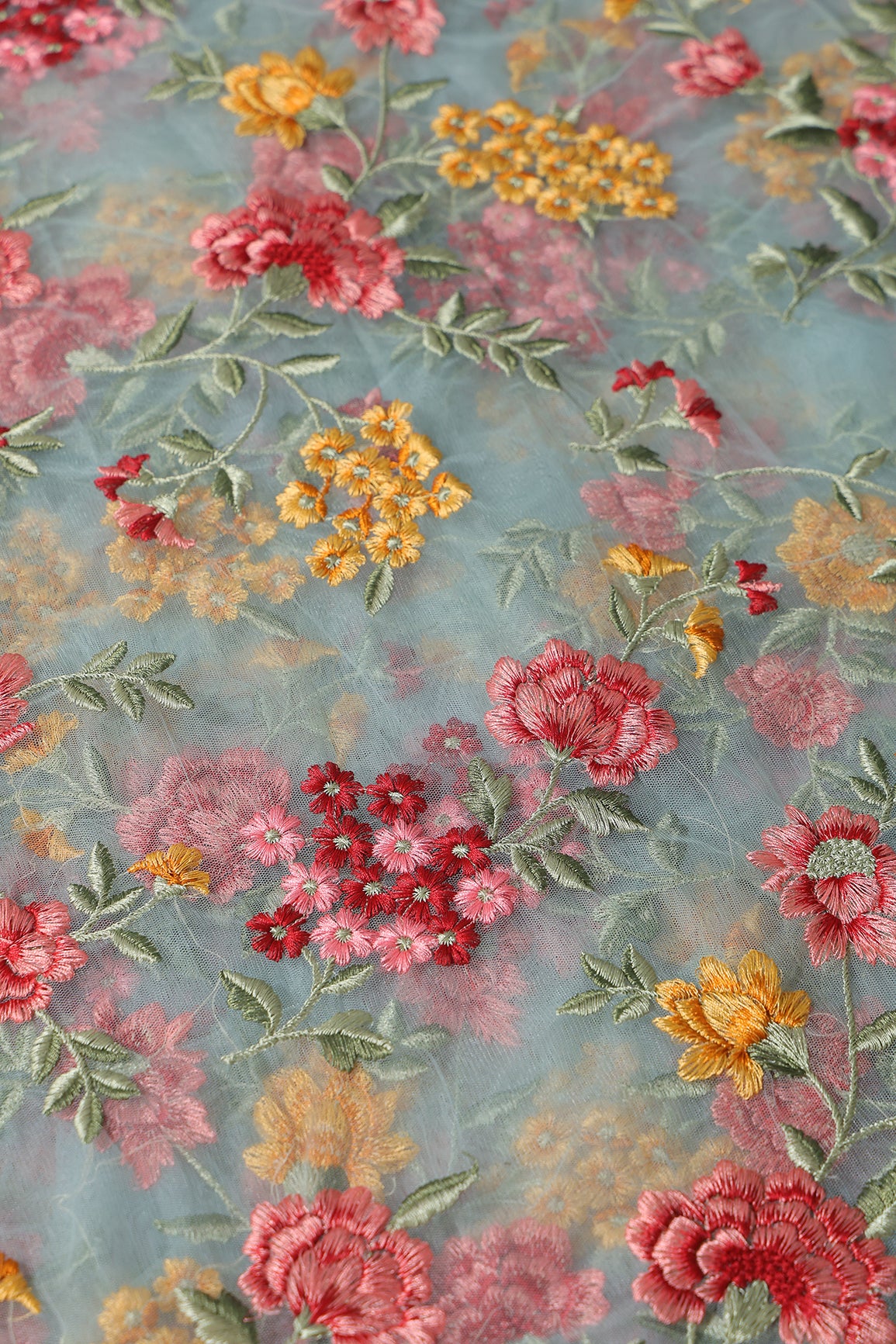 Multi Colour Floral Thread Embroidery Work On Sky Blue Soft Net Fabric