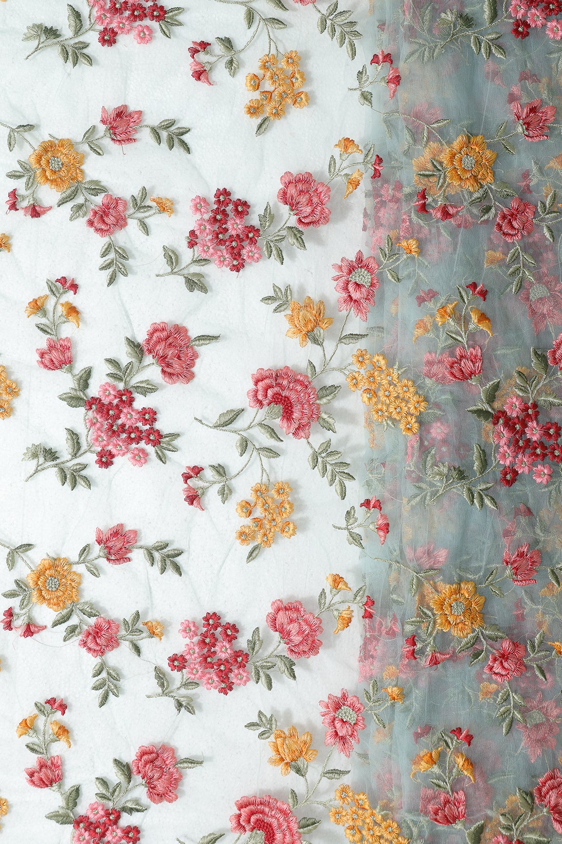 Multi Colour Floral Thread Embroidery Work On Sky Blue Soft Net Fabric