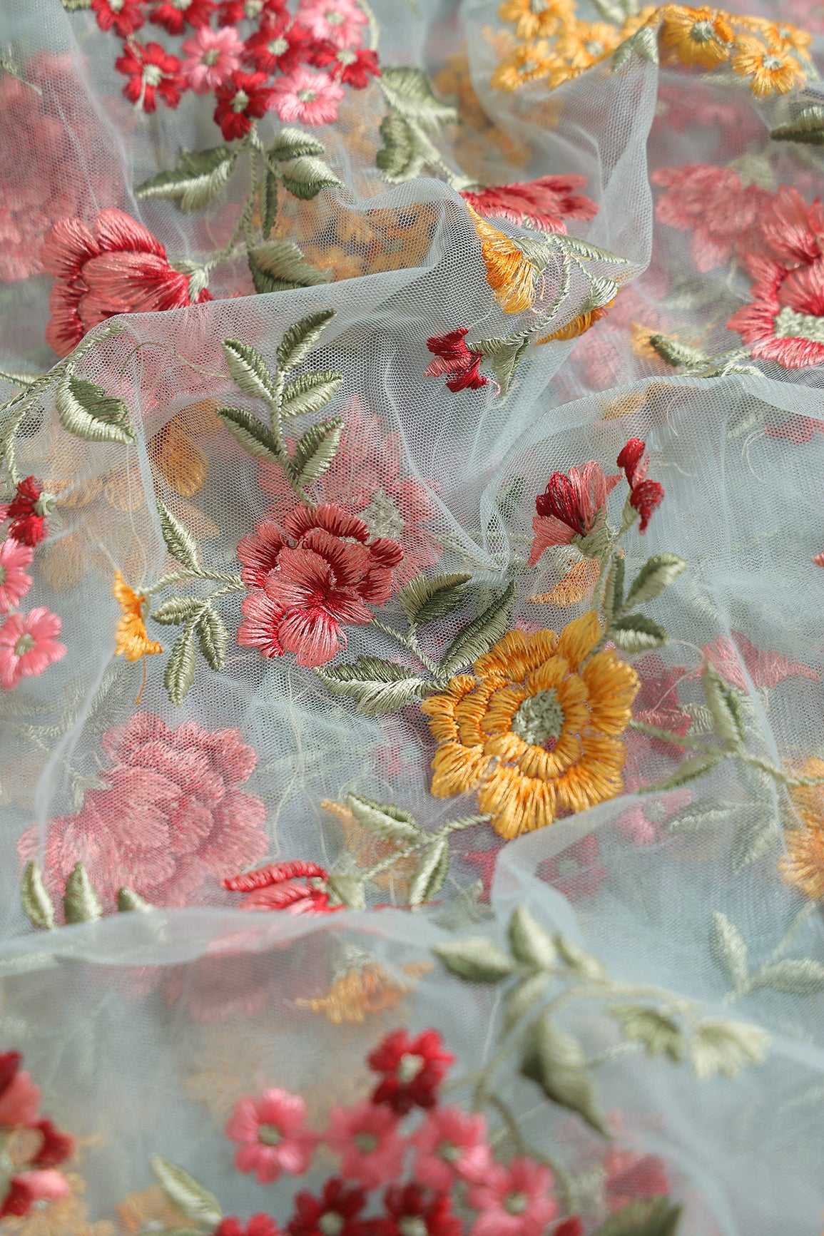 Multi Colour Floral Thread Embroidery Work On Sky Blue Soft Net Fabric