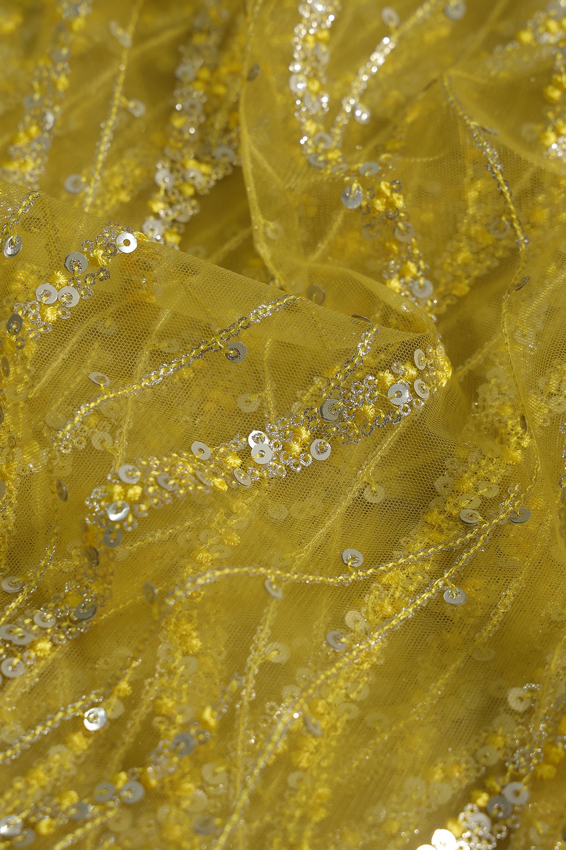 Gold And Silver Sequins With Lemon Yellow Thread Wavy Embroidery Work On Lemon Yellow Soft Net Fabric