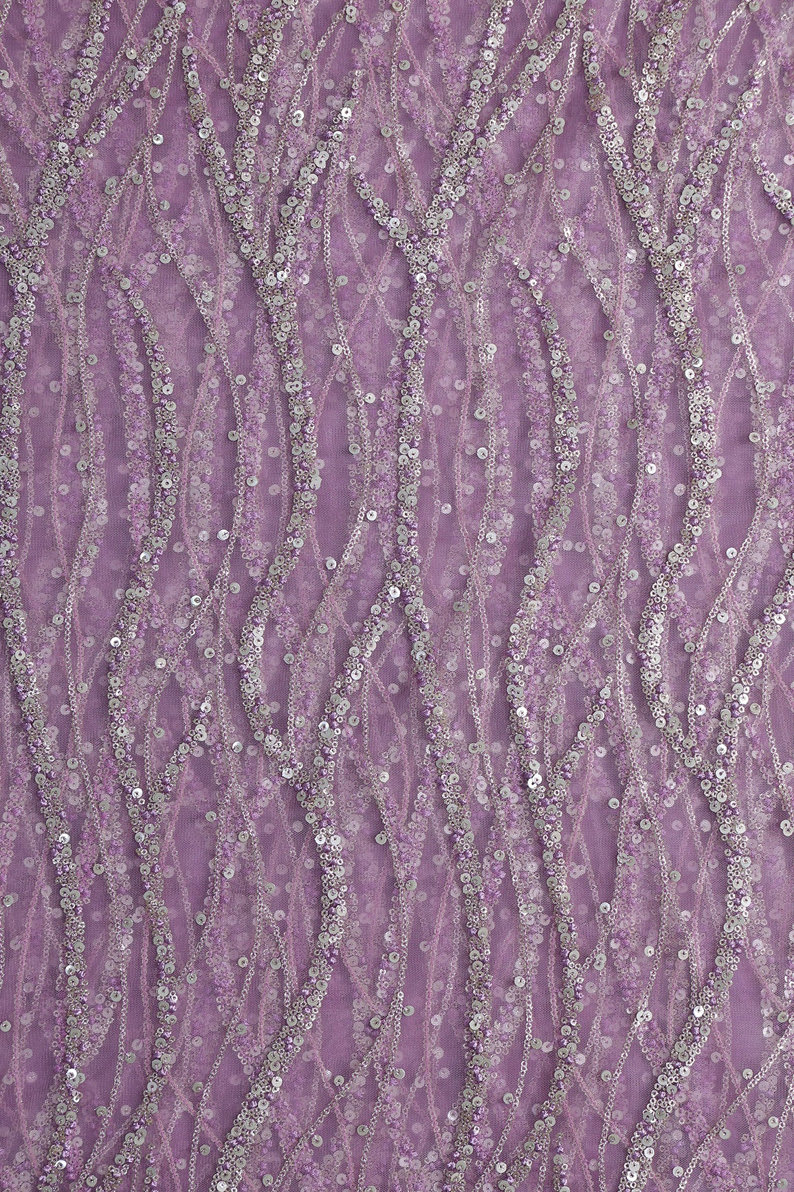 Gold And Silver Sequins With Lavender Thread Wavy Embroidery Work On Lavender Soft Net Fabric