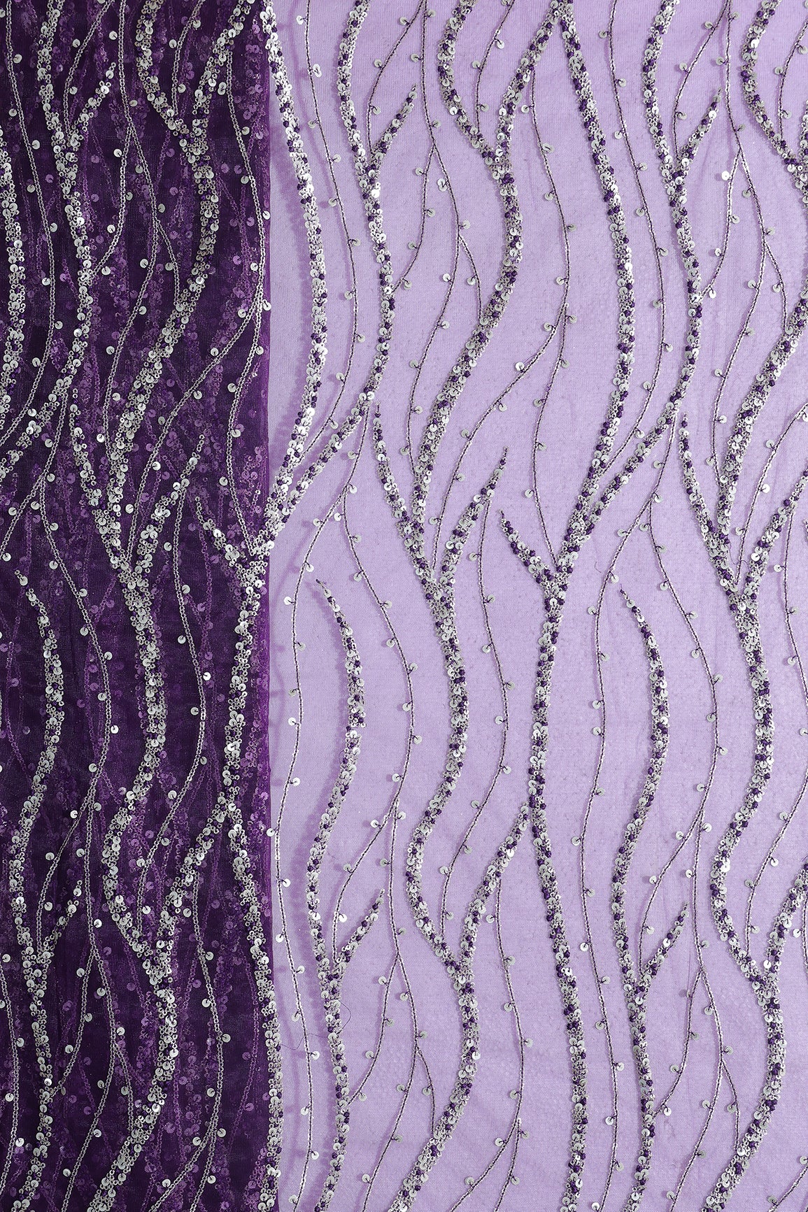 Gold And Silver Sequins With Purple Thread Wavy Embroidery Work On Purple Soft Net Fabric