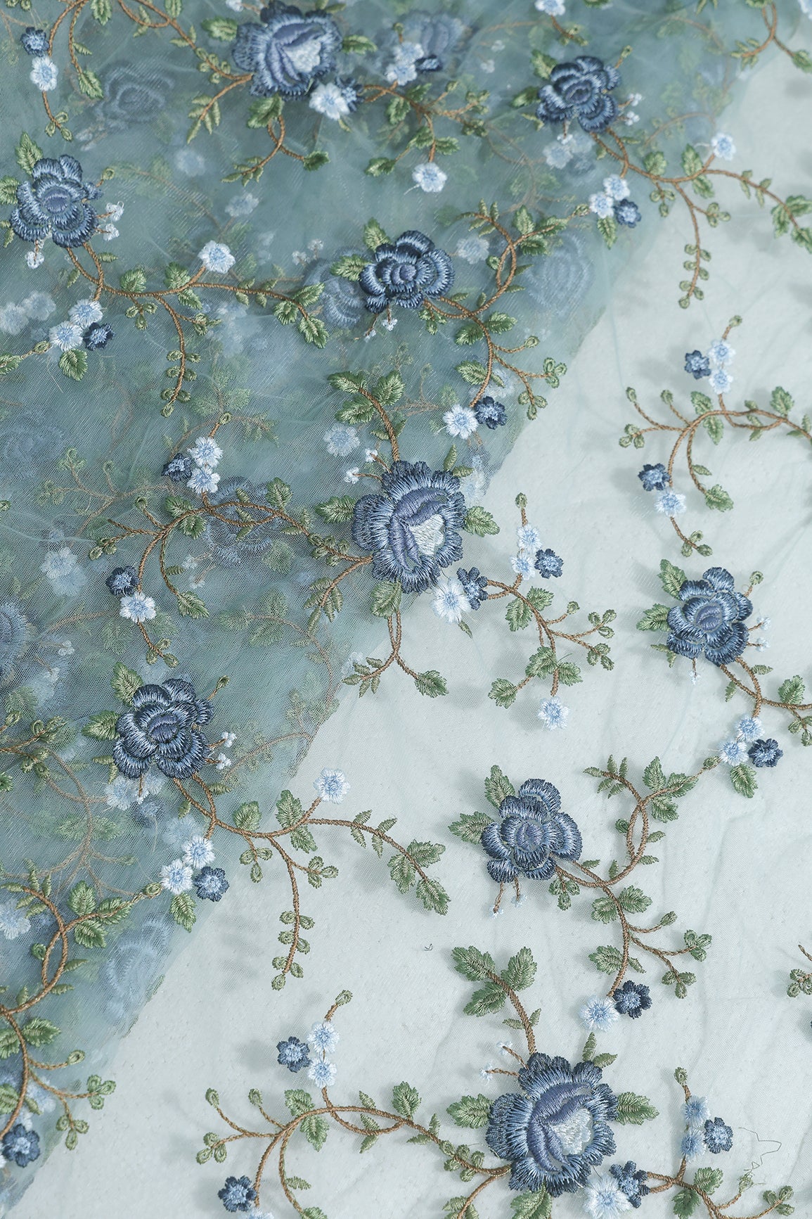 Multi Colour Floral Thread Embroidery Work On Teal Soft Net Fabric