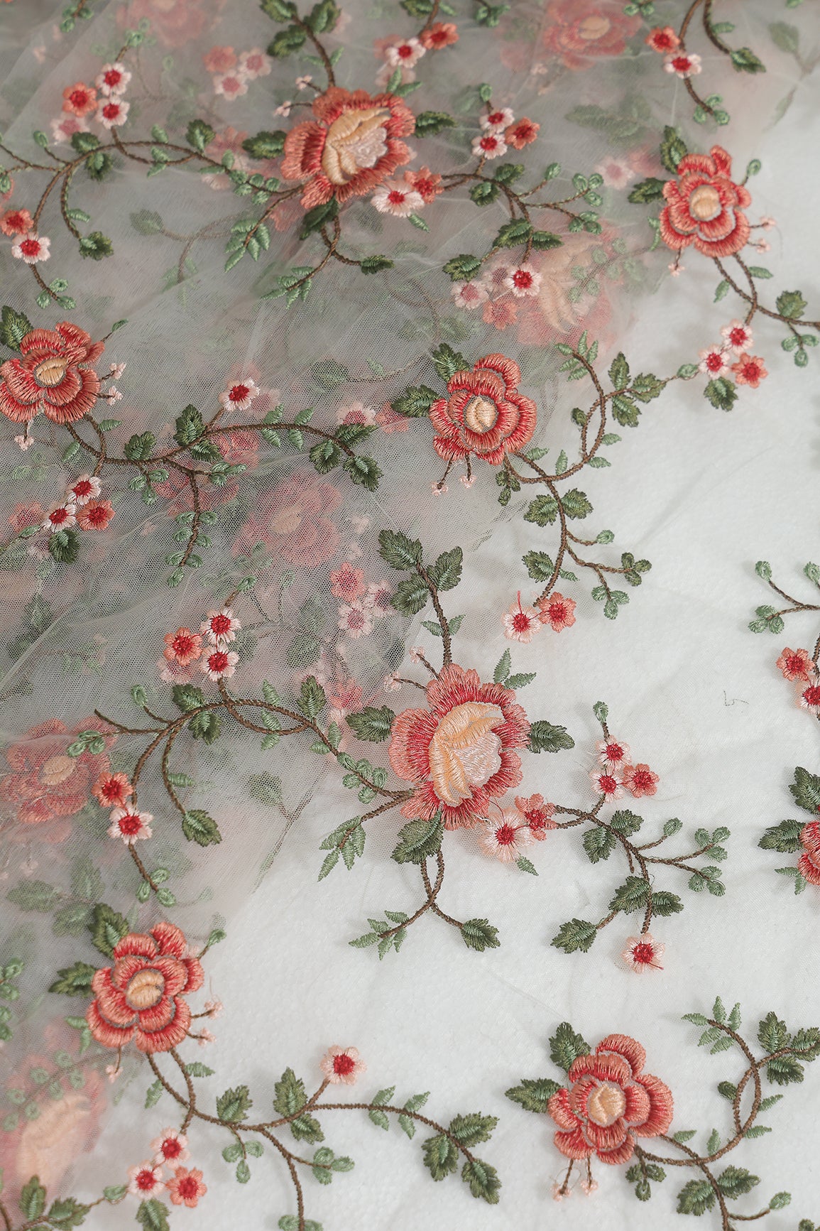 Multi Colour Floral Thread Embroidery Work On White Soft Net Fabric