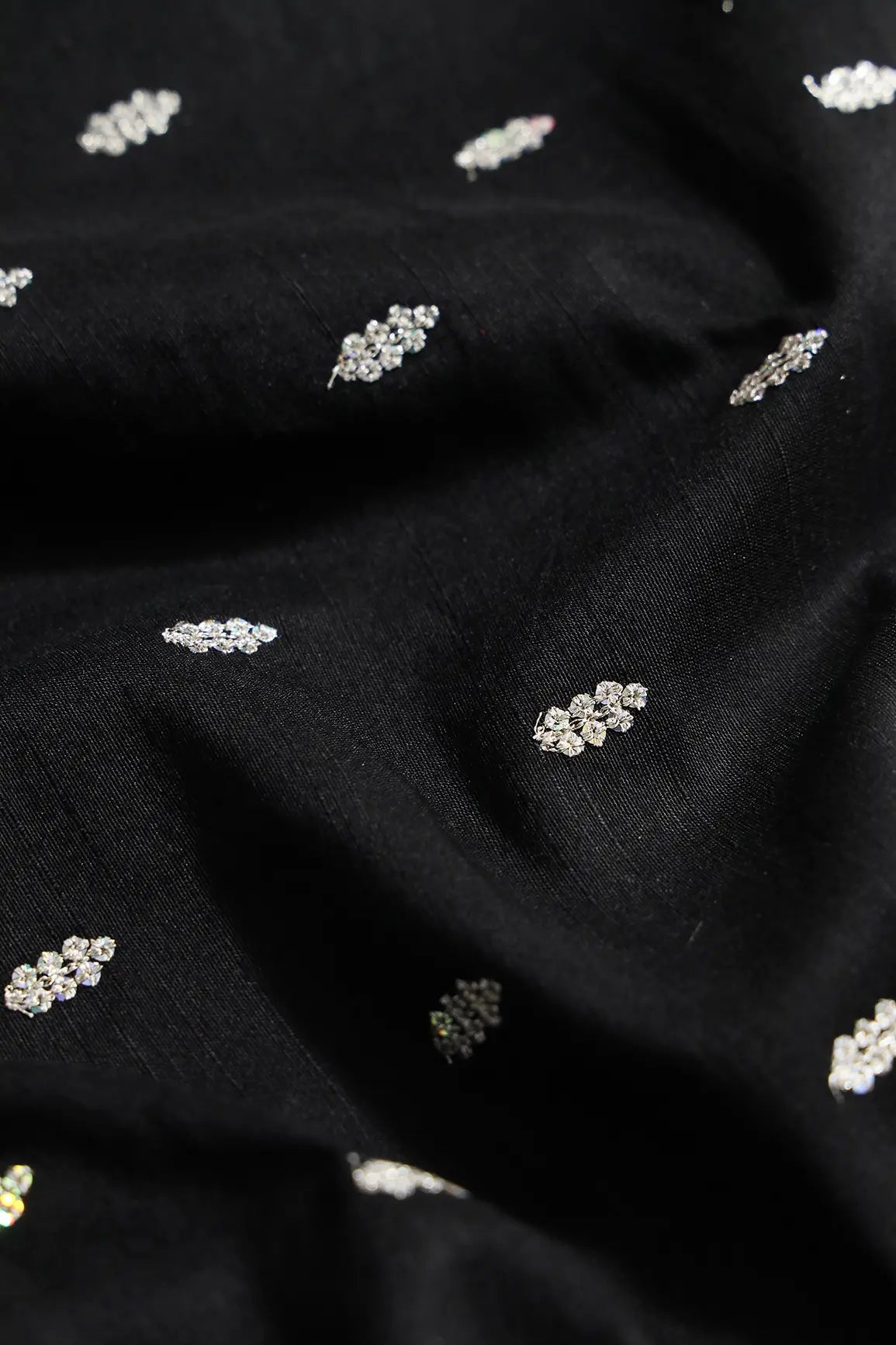 Silver Sequins With Gold Zari Small Motif Embroidery Work On Black Raw Silk Fabric