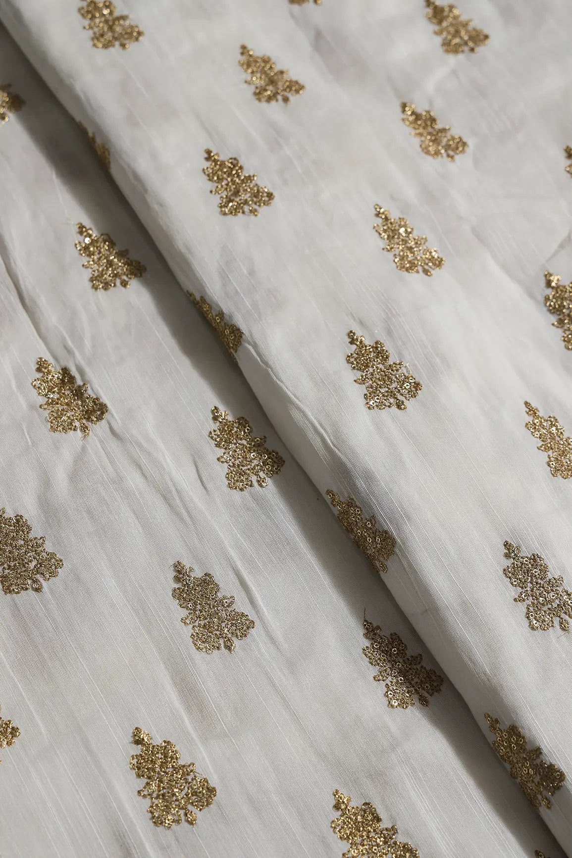 Gold Sequins With Gold Zari Big Motif Embroidery Work On White Raw Silk Fabric