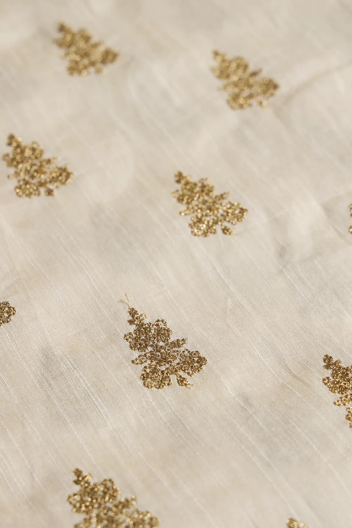 Gold Sequins With Gold Zari Big Motif Embroidery Work On Cream Raw Silk Fabric