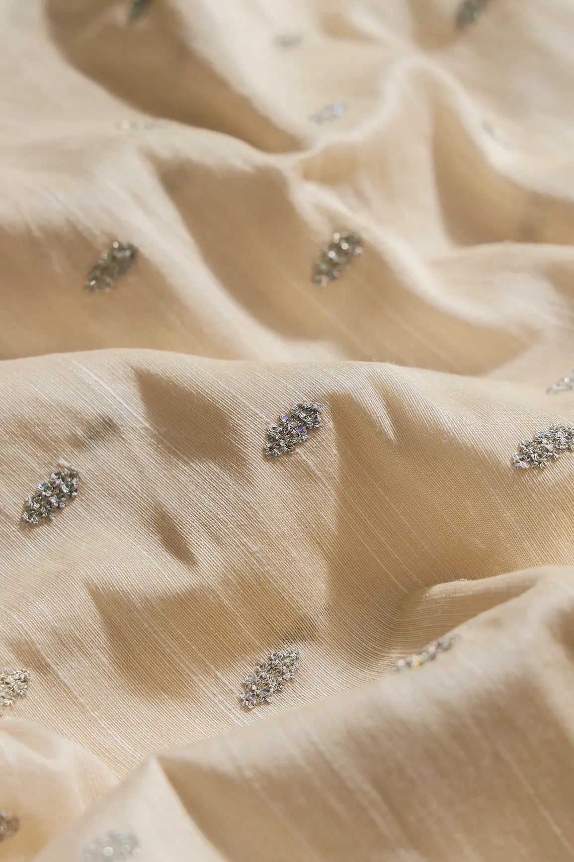 Silver Sequins With Gold Zari Small Motif Embroidery Work On Cream Raw Silk Fabric