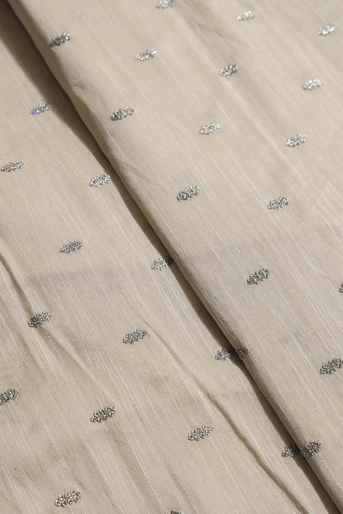 Silver Sequins With Gold Zari Small Motif Embroidery Work On Cream Raw Silk Fabric