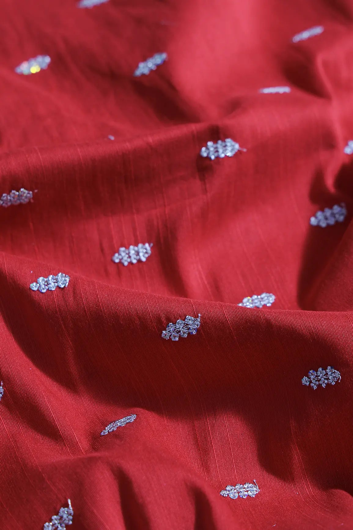 Silver Sequins With Gold Zari Small Motif Embroidery Work On Red Raw Silk Fabric