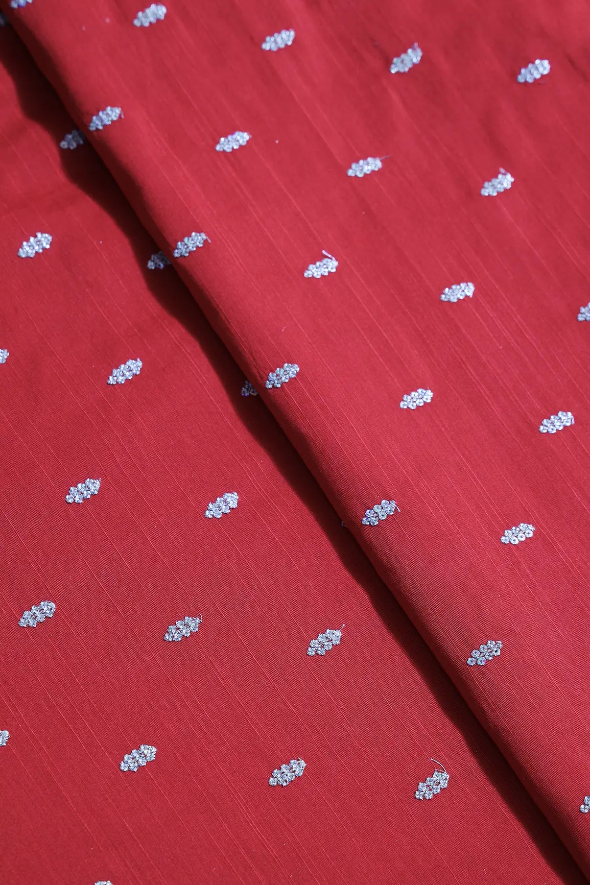 Silver Sequins With Gold Zari Small Motif Embroidery Work On Red Raw Silk Fabric