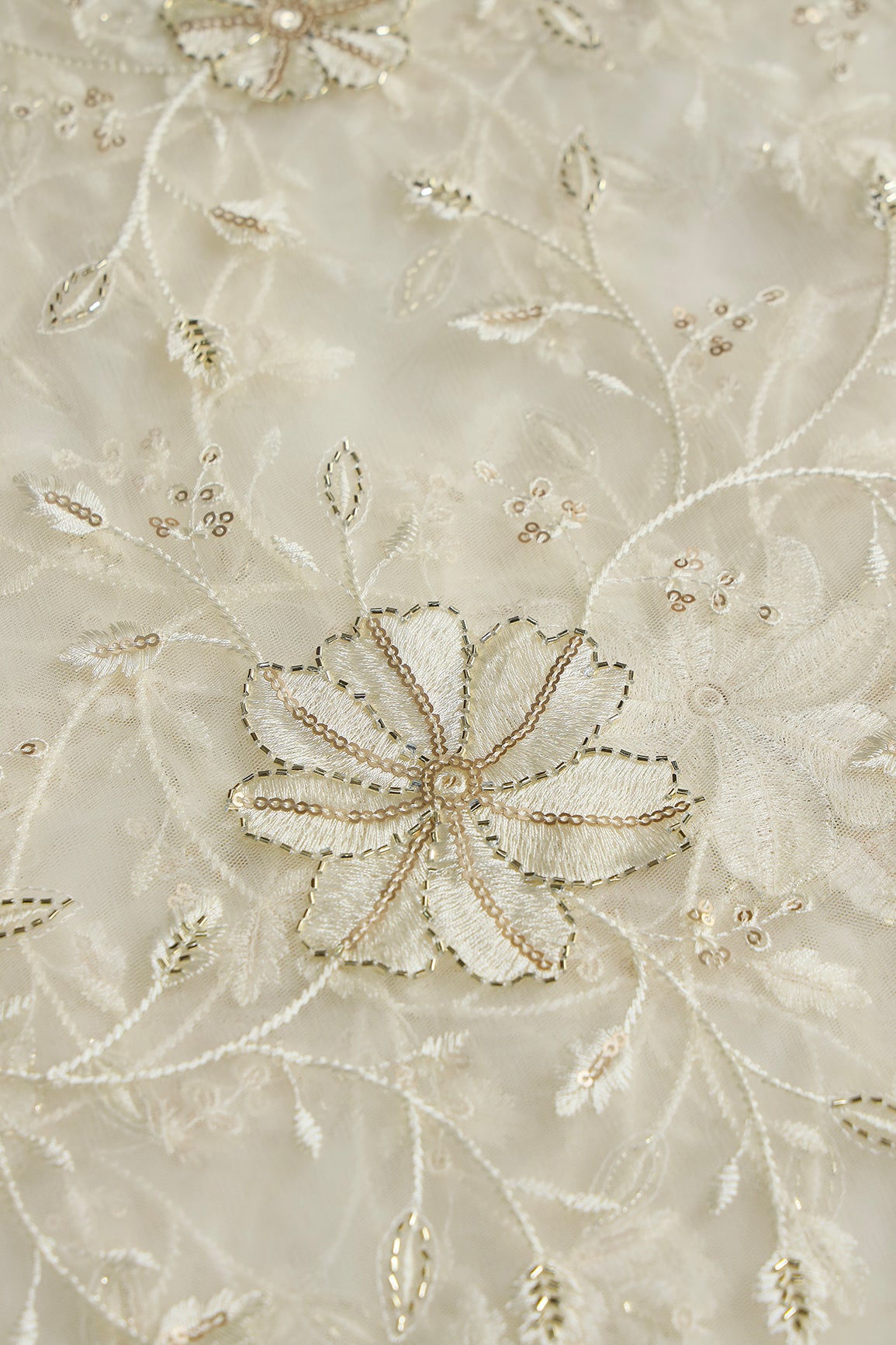 Cream Thread & Beads With Gold Sequins Floral Leafy Embroidery Work On Cream Soft Net Fabric